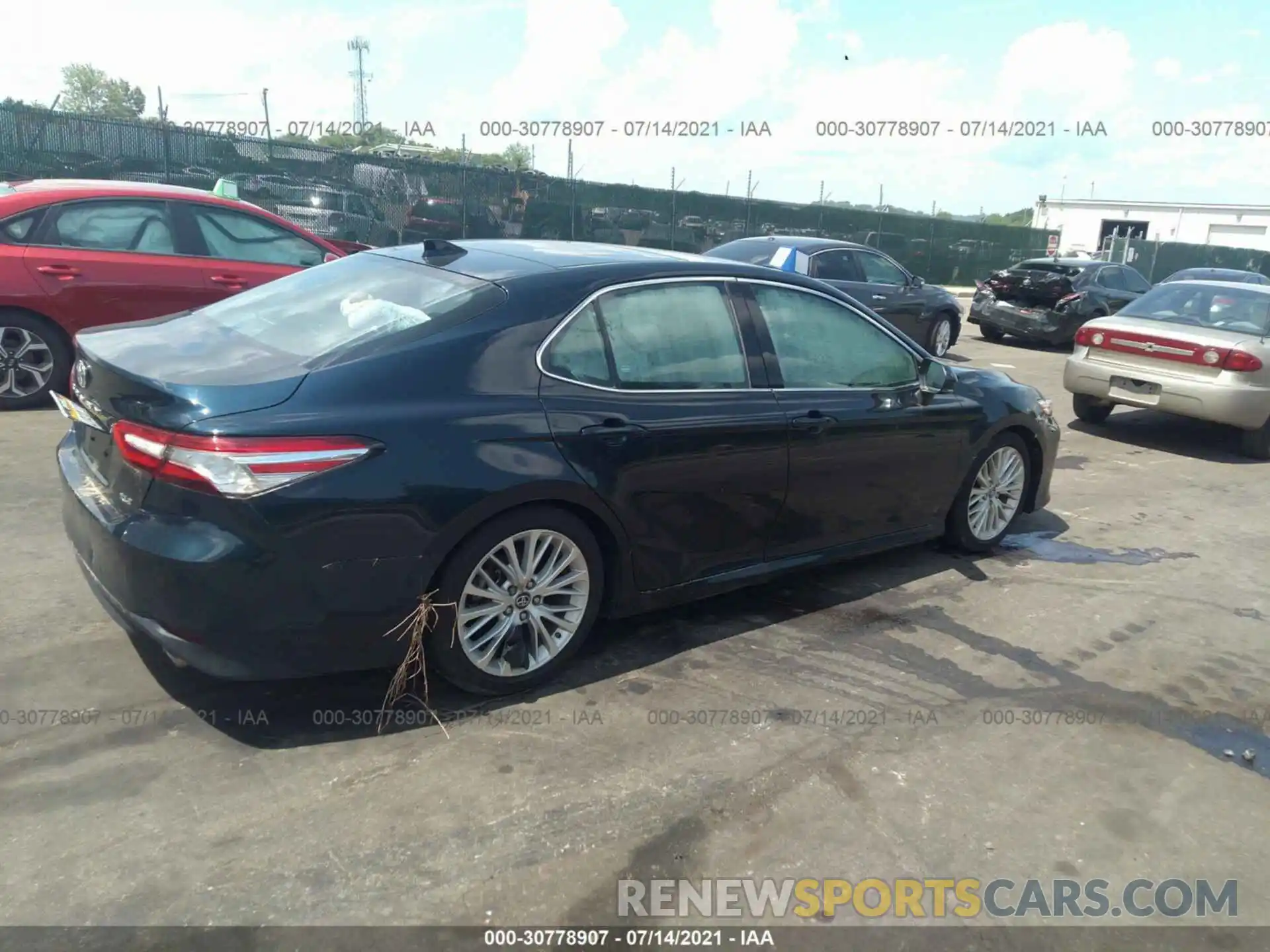 4 Photograph of a damaged car 4T1B11HK0KU244661 TOYOTA CAMRY 2019