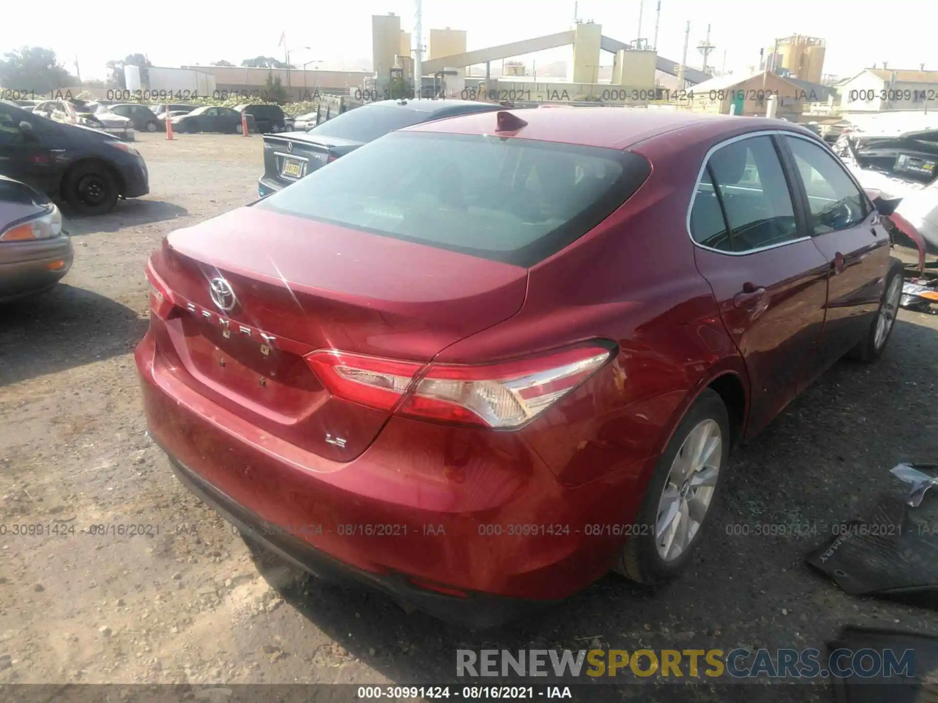 4 Photograph of a damaged car 4T1B11HK0KU246104 TOYOTA CAMRY 2019