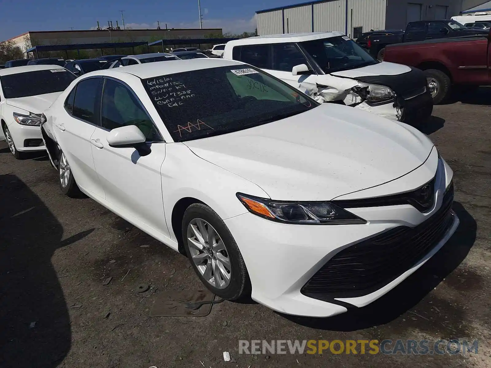 1 Photograph of a damaged car 4T1B11HK0KU251657 TOYOTA CAMRY 2019