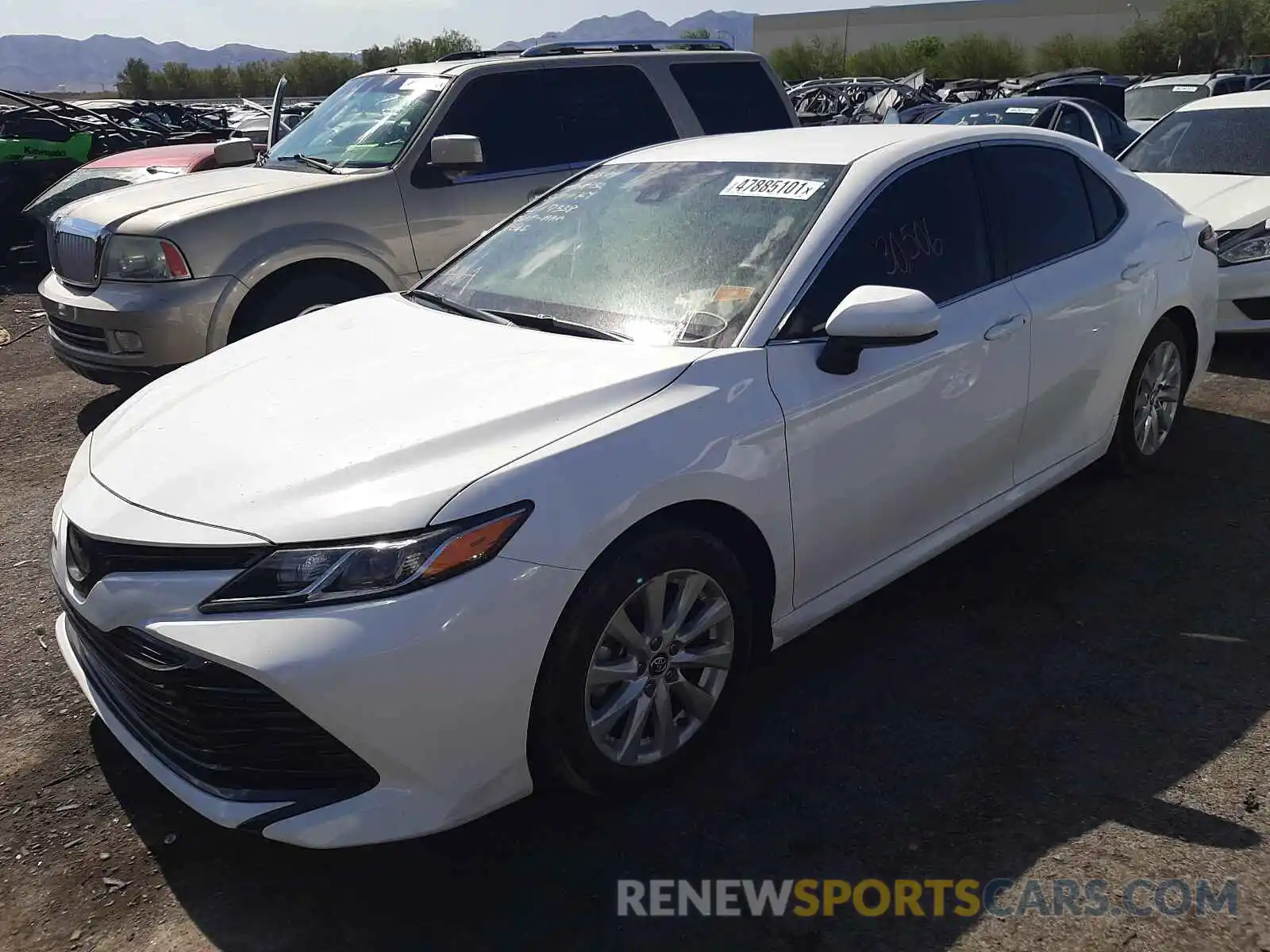 2 Photograph of a damaged car 4T1B11HK0KU251657 TOYOTA CAMRY 2019