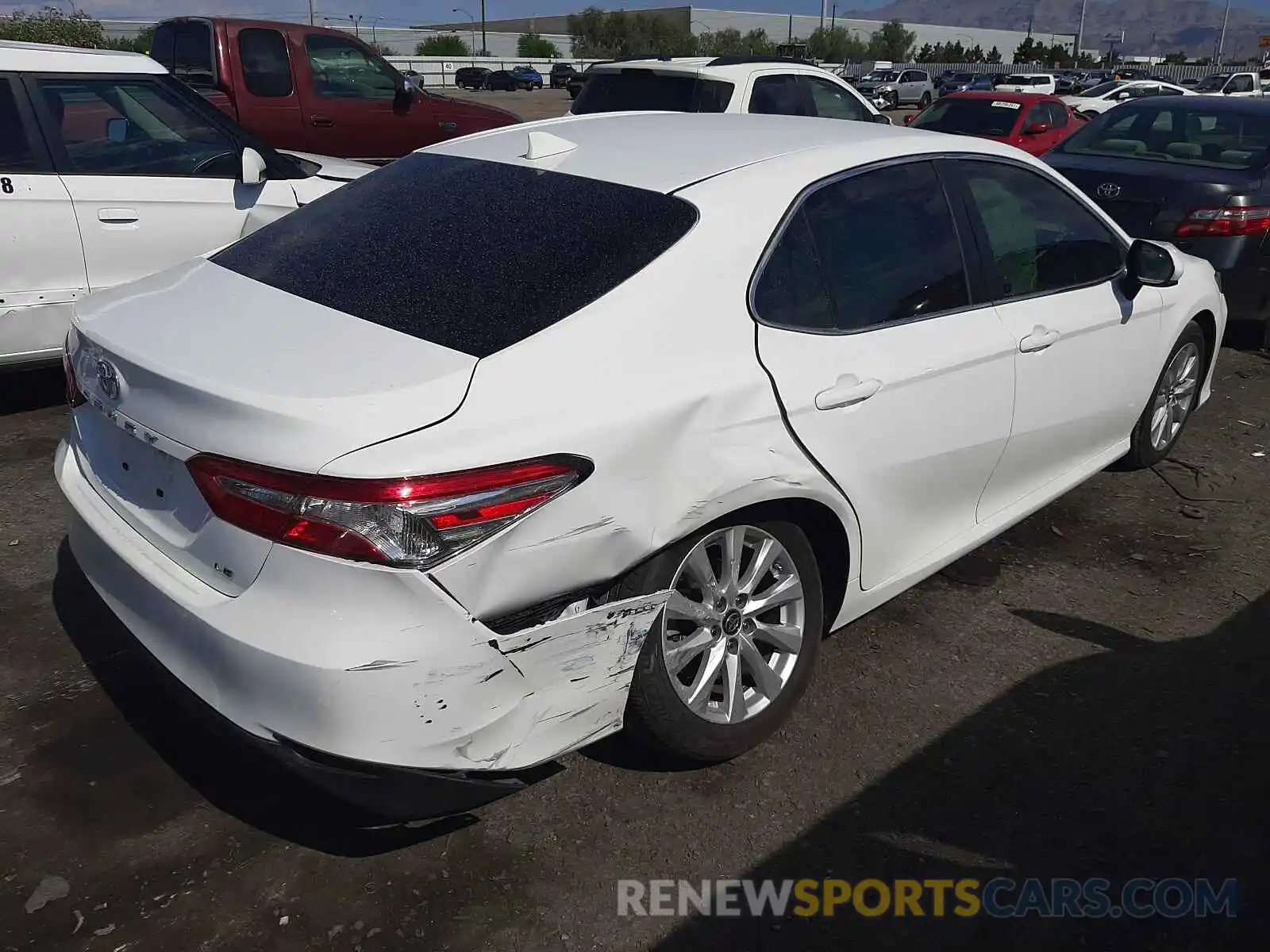 4 Photograph of a damaged car 4T1B11HK0KU251657 TOYOTA CAMRY 2019