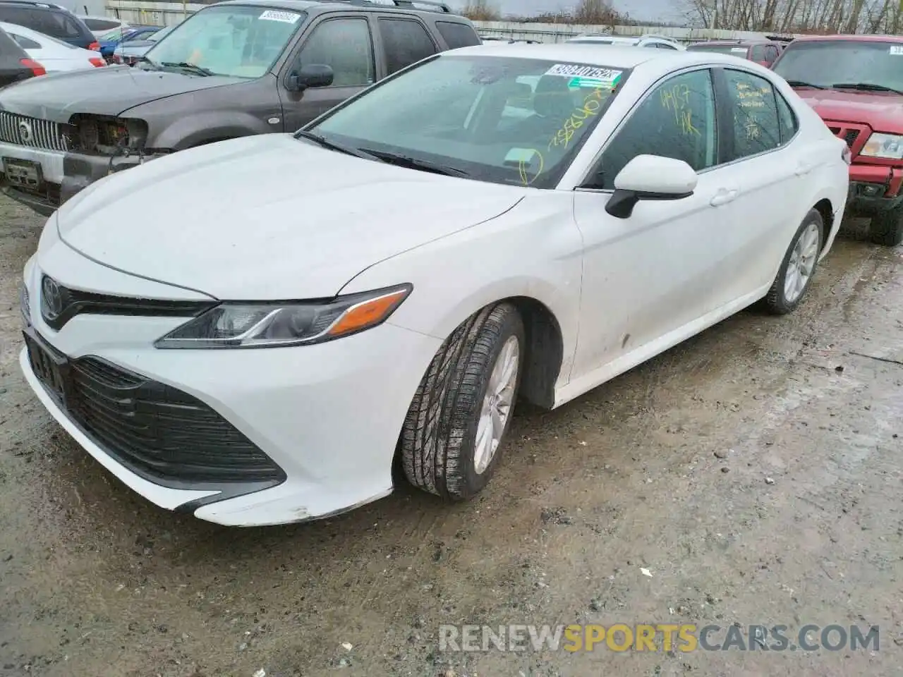 2 Photograph of a damaged car 4T1B11HK0KU251691 TOYOTA CAMRY 2019