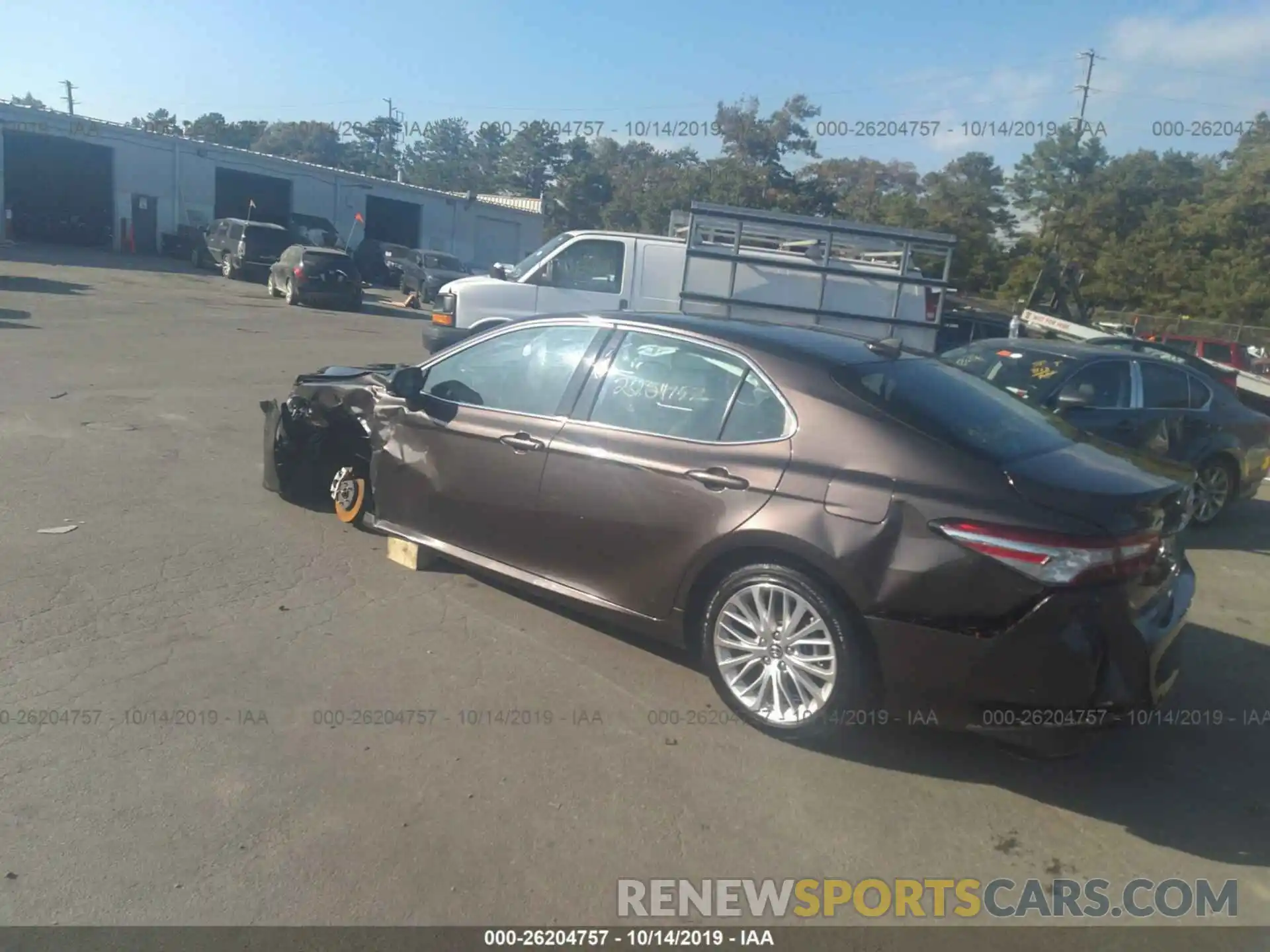 3 Photograph of a damaged car 4T1B11HK0KU251979 TOYOTA CAMRY 2019