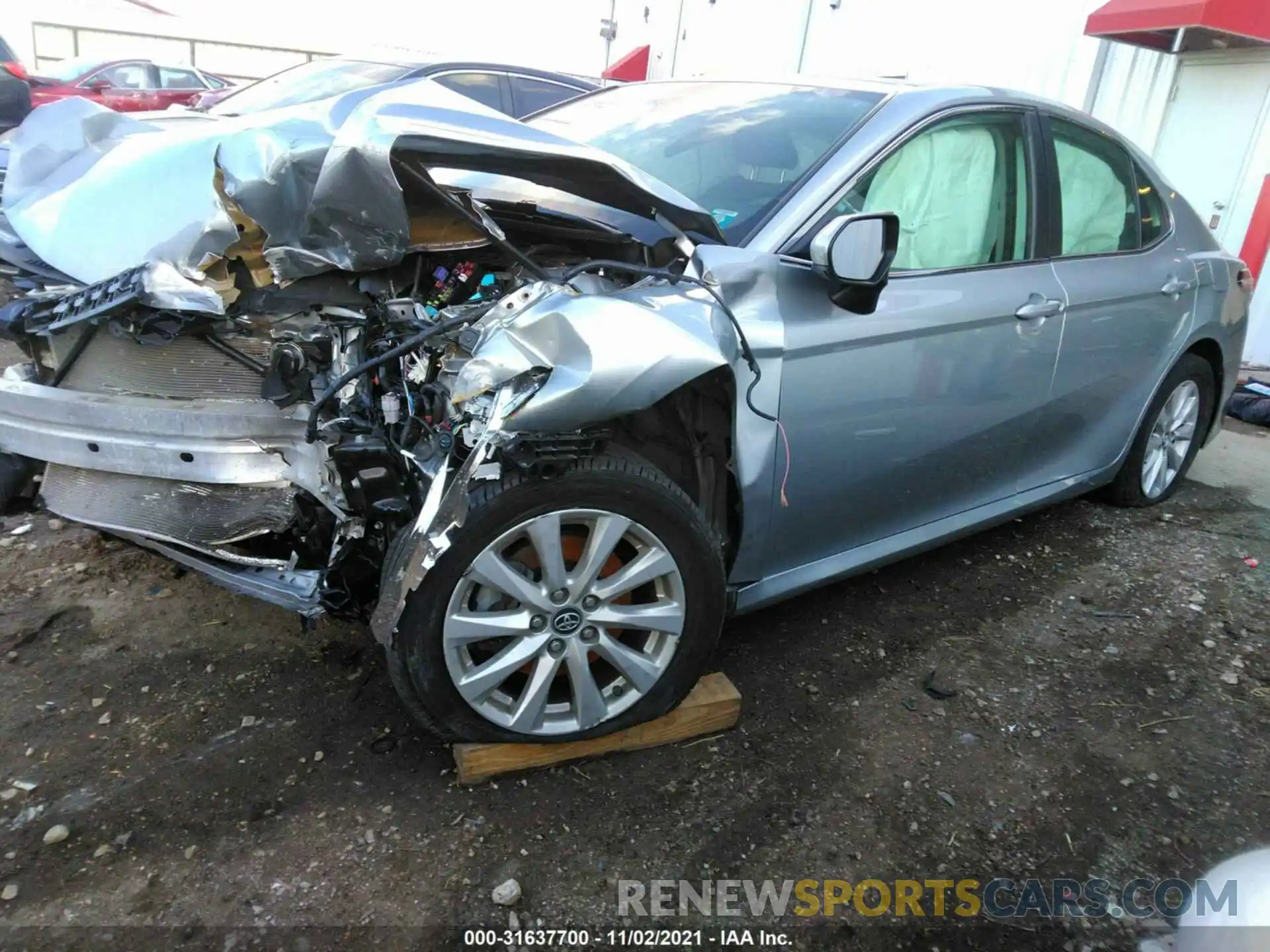 2 Photograph of a damaged car 4T1B11HK0KU256163 TOYOTA CAMRY 2019