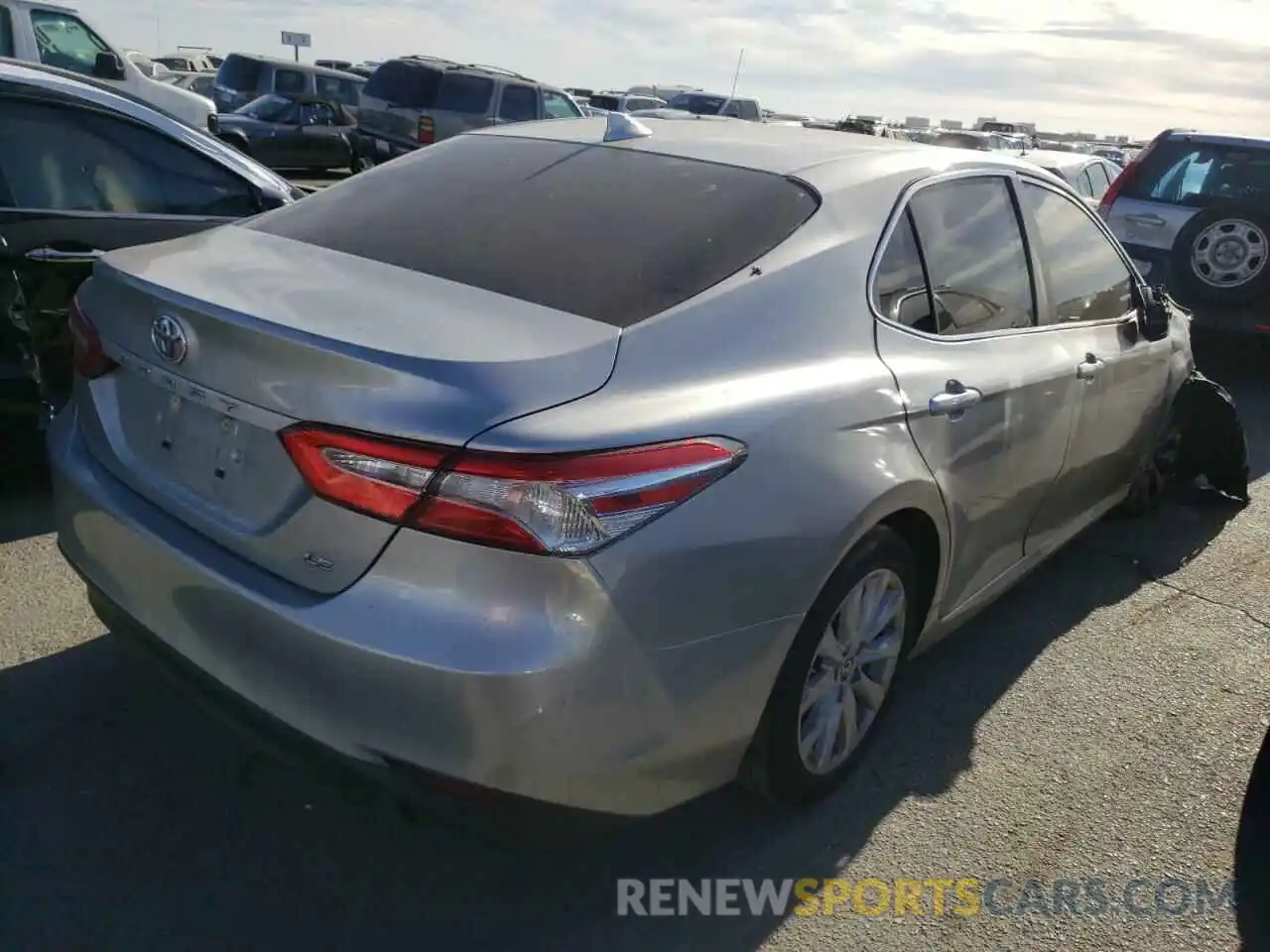 4 Photograph of a damaged car 4T1B11HK0KU256521 TOYOTA CAMRY 2019