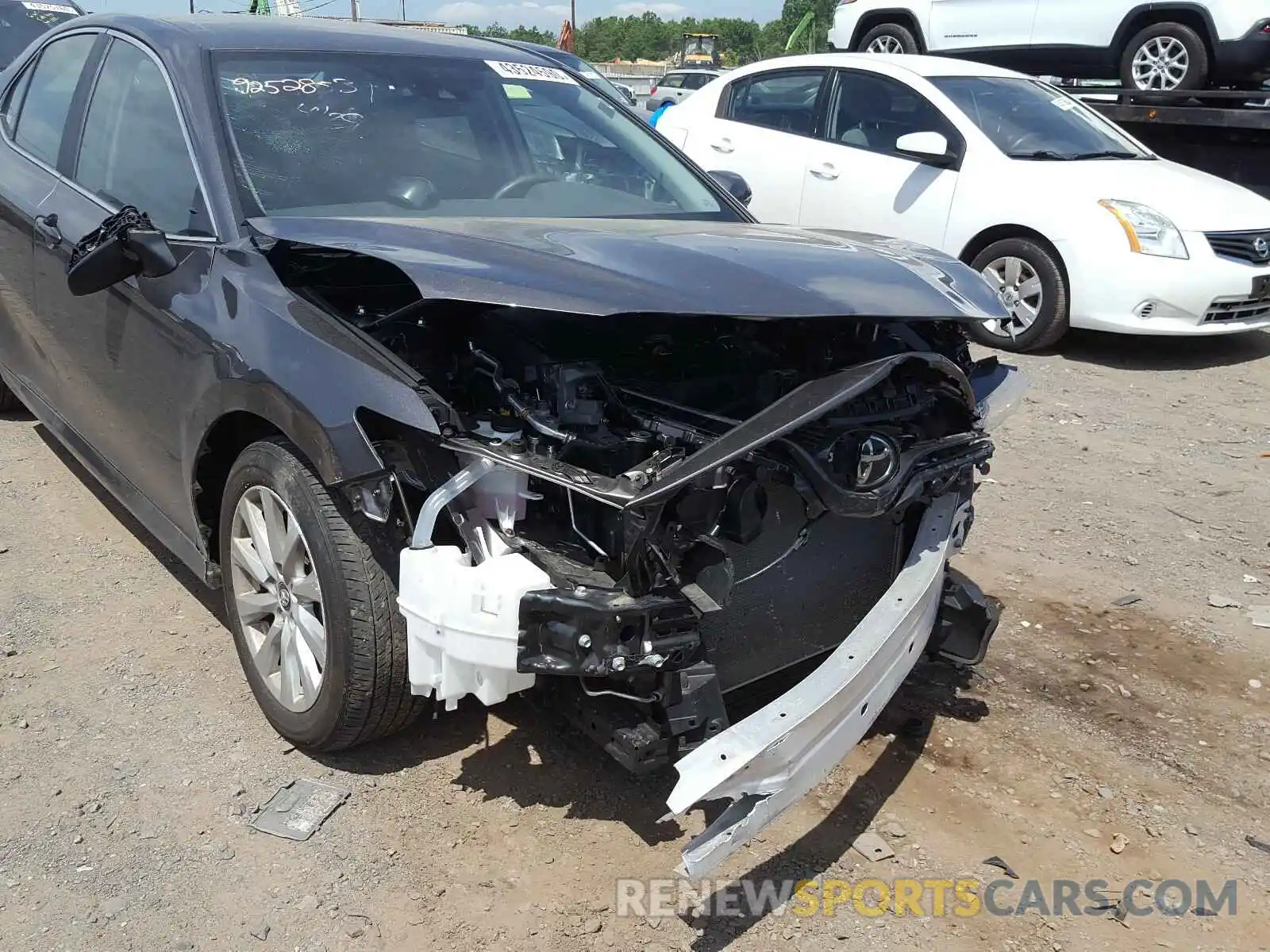 9 Photograph of a damaged car 4T1B11HK0KU256776 TOYOTA CAMRY 2019