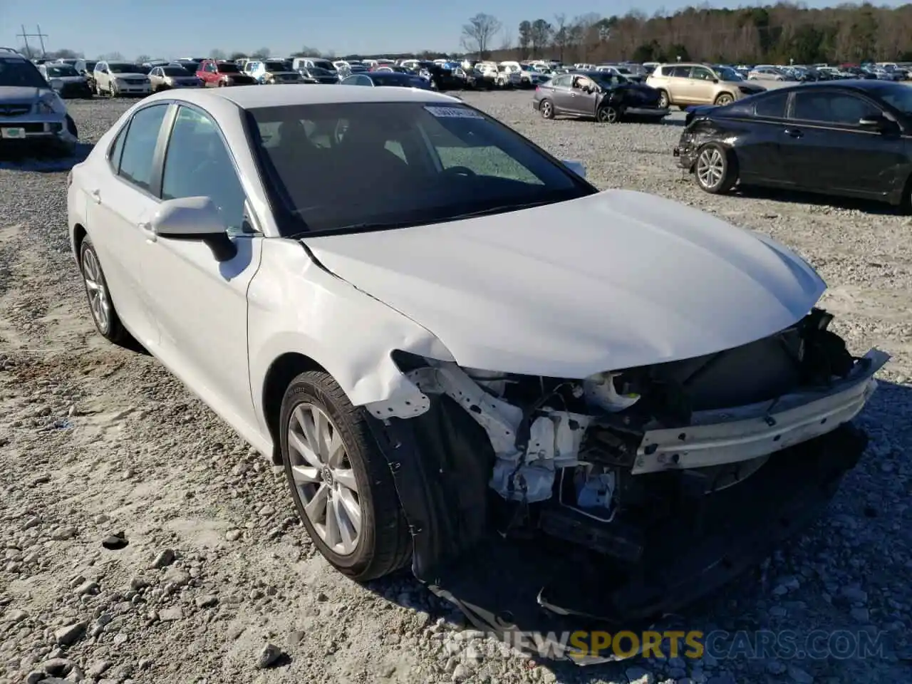 1 Photograph of a damaged car 4T1B11HK0KU257216 TOYOTA CAMRY 2019