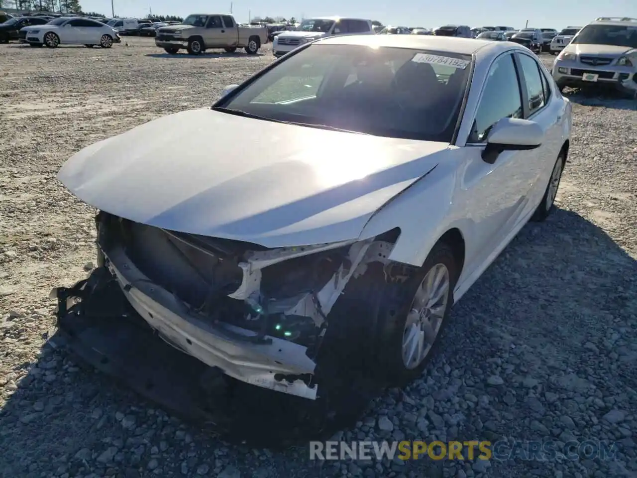 2 Photograph of a damaged car 4T1B11HK0KU257216 TOYOTA CAMRY 2019