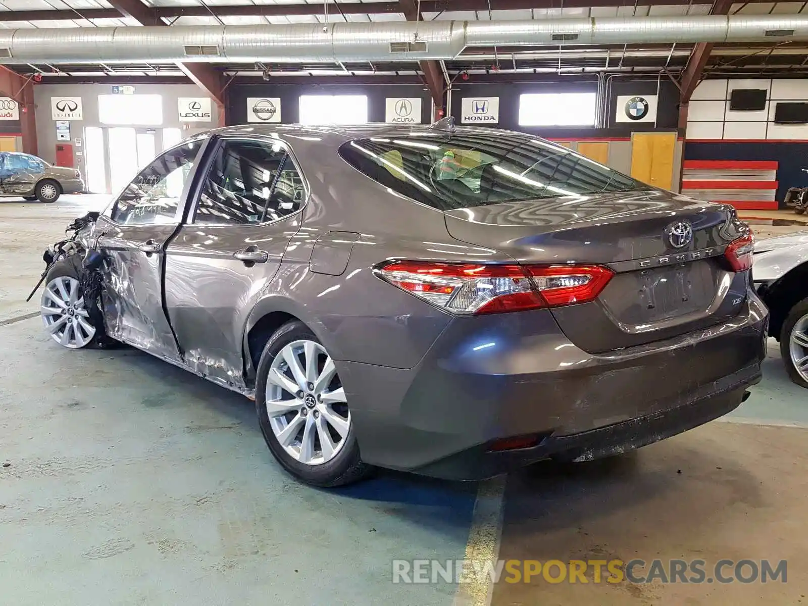 3 Photograph of a damaged car 4T1B11HK0KU257328 TOYOTA CAMRY 2019