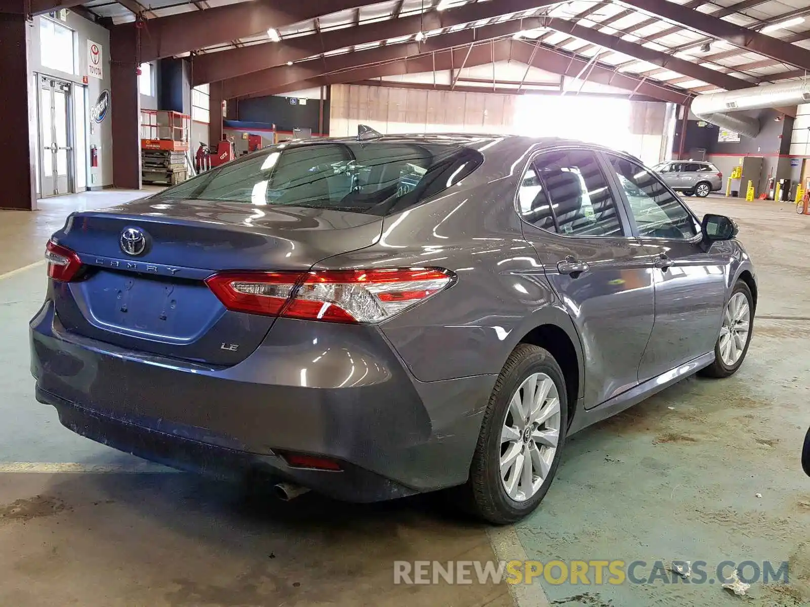 4 Photograph of a damaged car 4T1B11HK0KU257328 TOYOTA CAMRY 2019