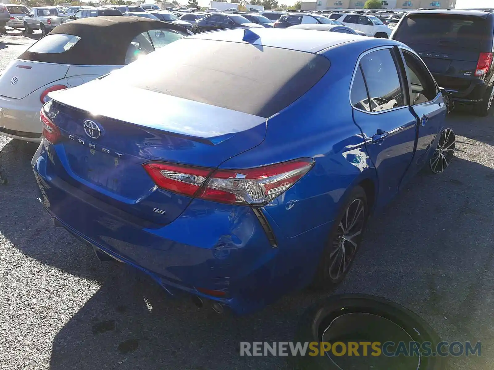 4 Photograph of a damaged car 4T1B11HK0KU257698 TOYOTA CAMRY 2019