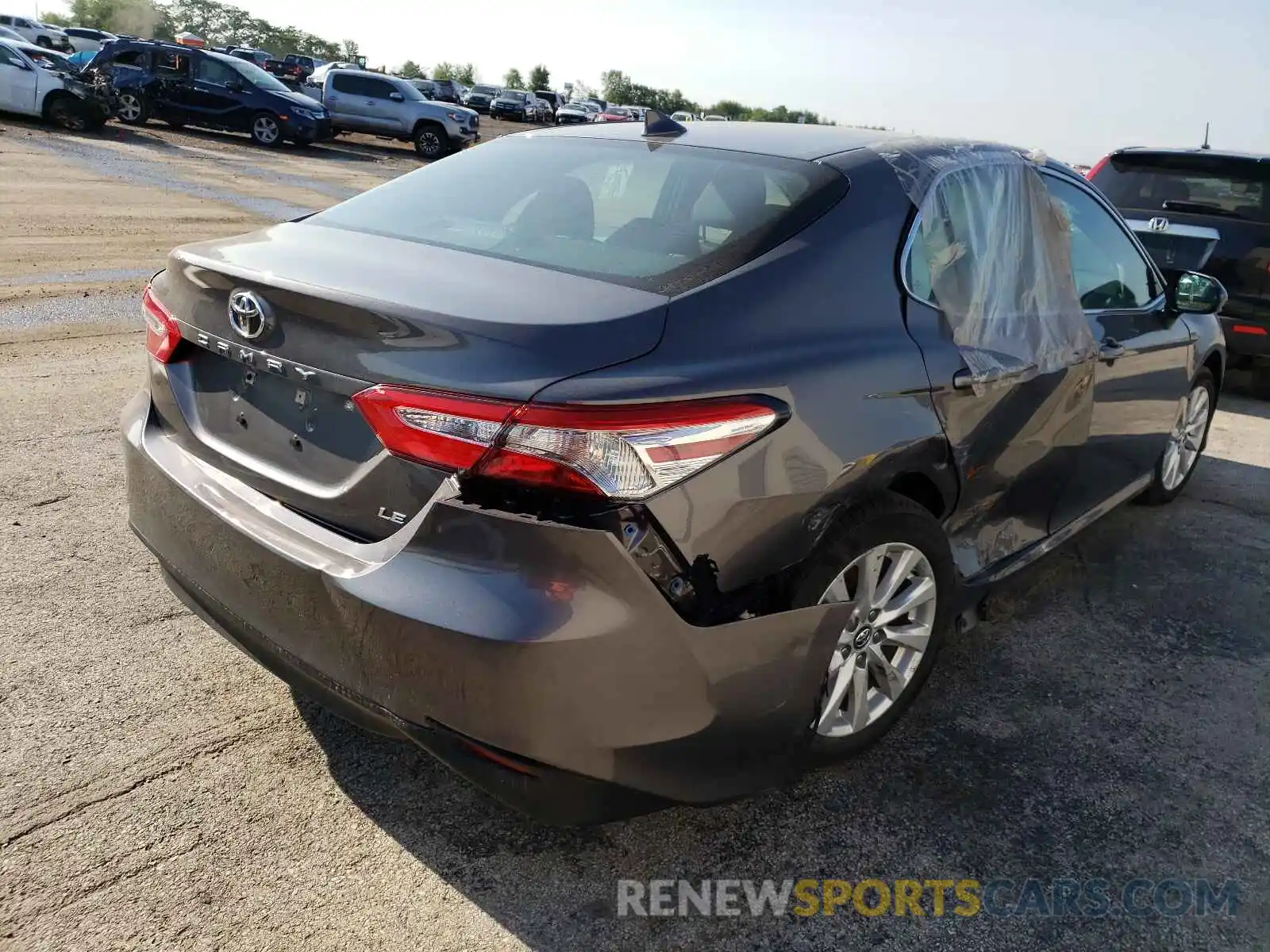 4 Photograph of a damaged car 4T1B11HK0KU257782 TOYOTA CAMRY 2019