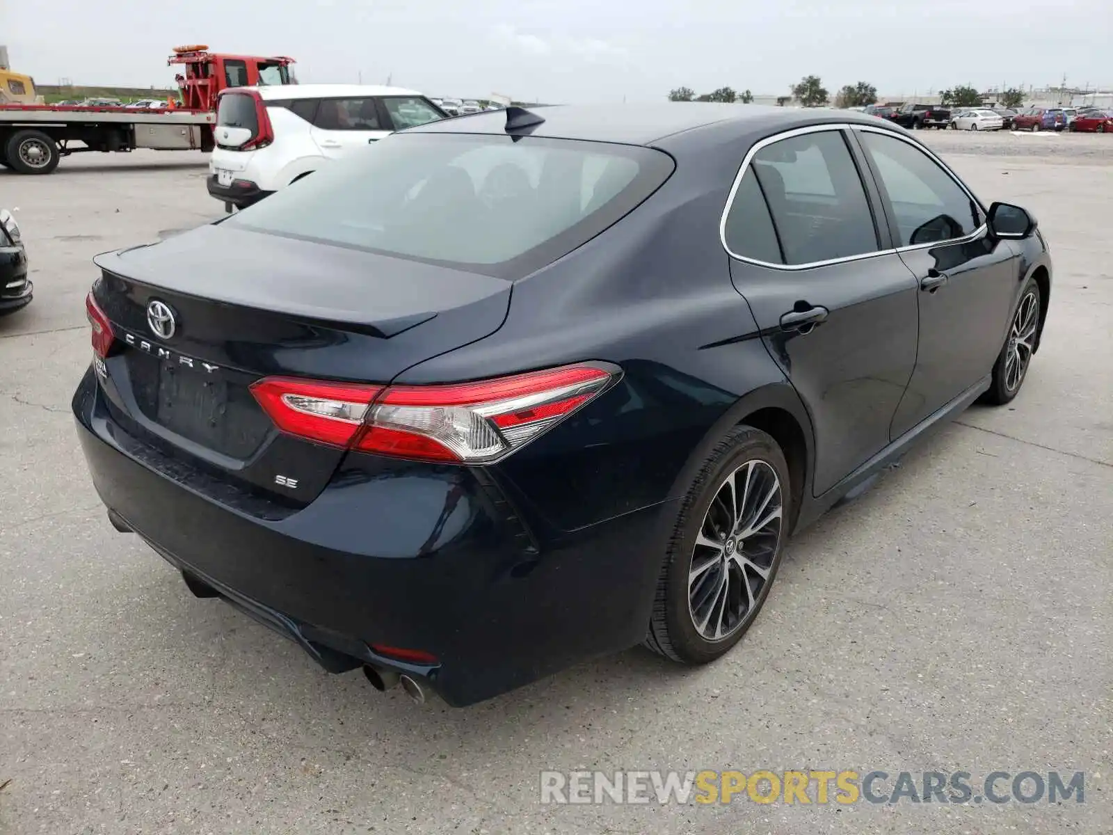 4 Photograph of a damaged car 4T1B11HK0KU257846 TOYOTA CAMRY 2019