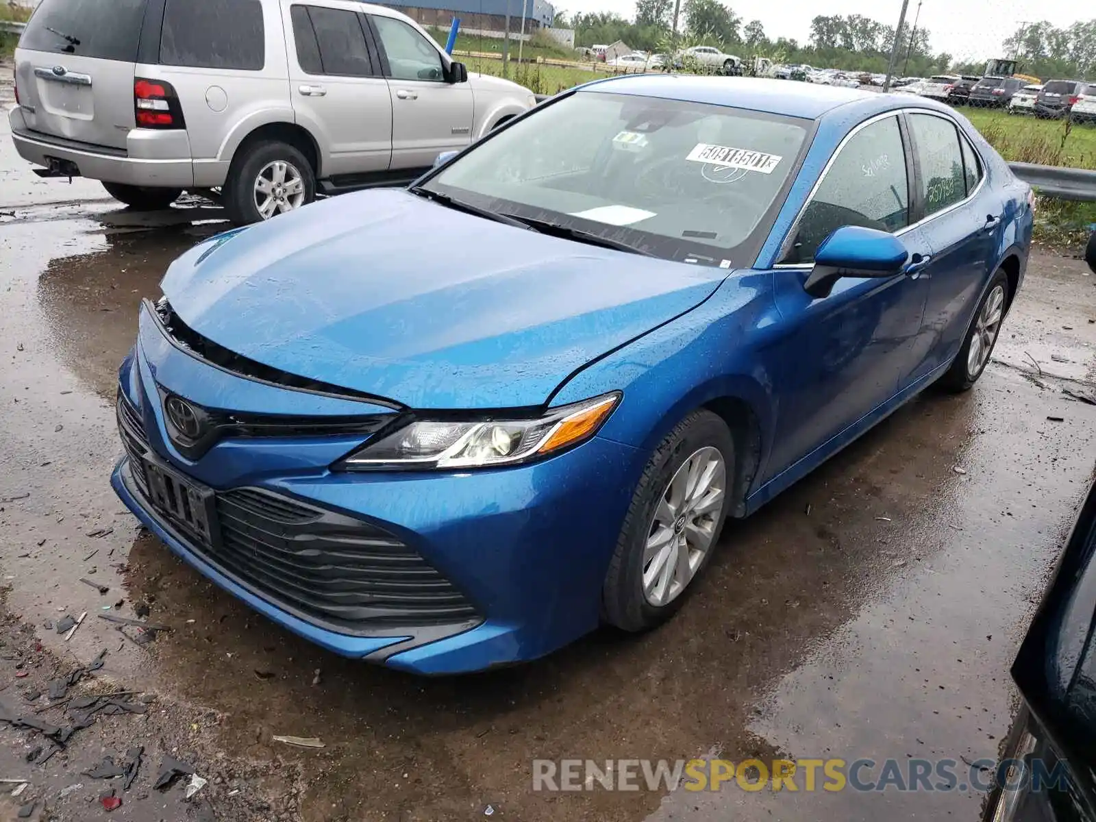 2 Photograph of a damaged car 4T1B11HK0KU257958 TOYOTA CAMRY 2019