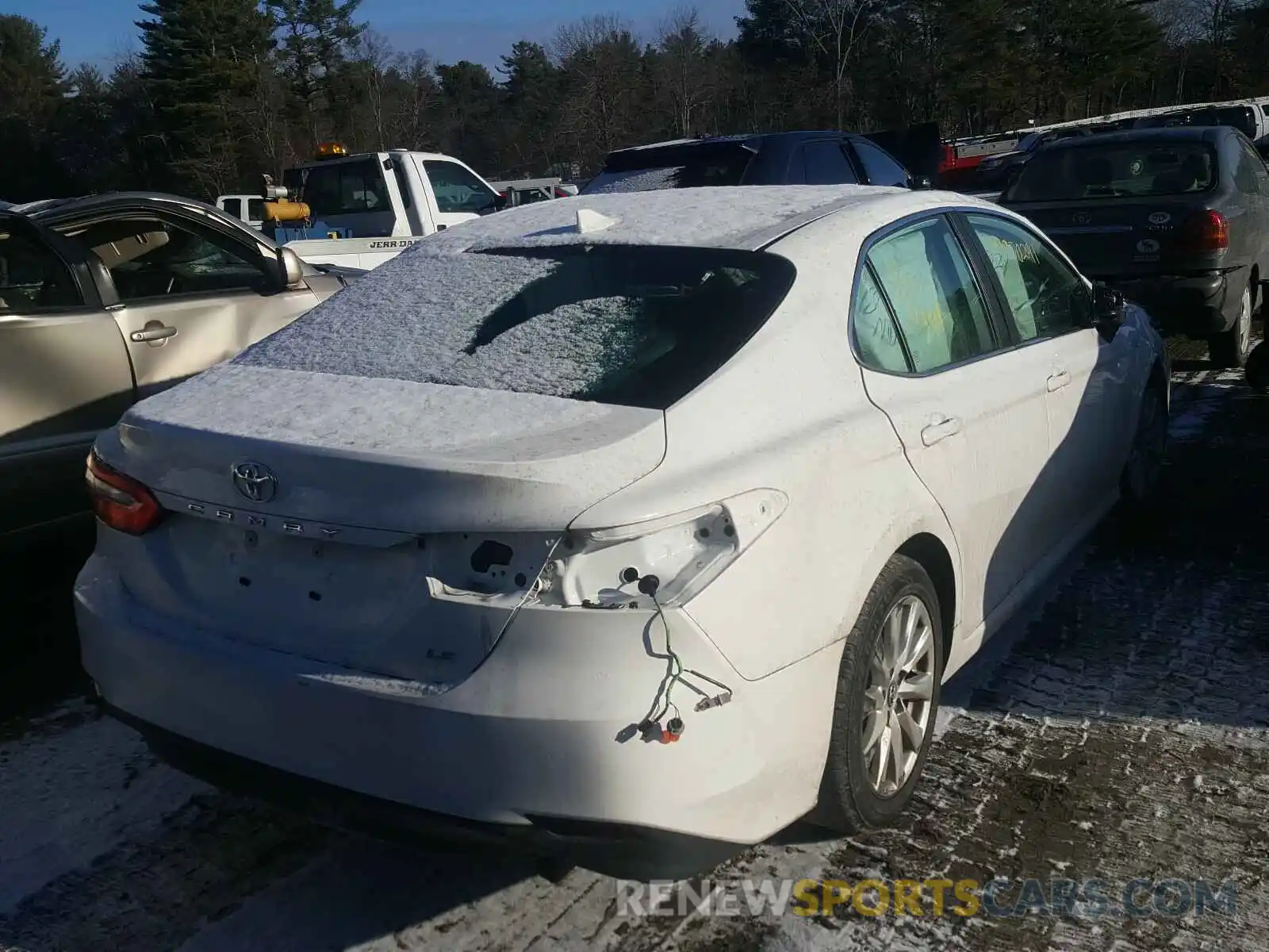 4 Photograph of a damaged car 4T1B11HK0KU258334 TOYOTA CAMRY 2019