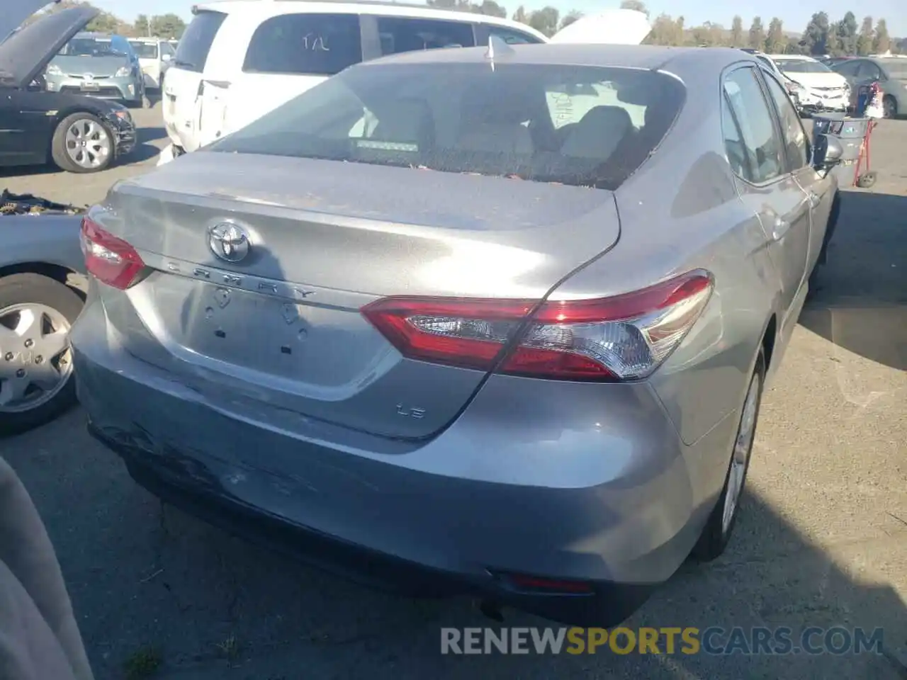 4 Photograph of a damaged car 4T1B11HK0KU261542 TOYOTA CAMRY 2019