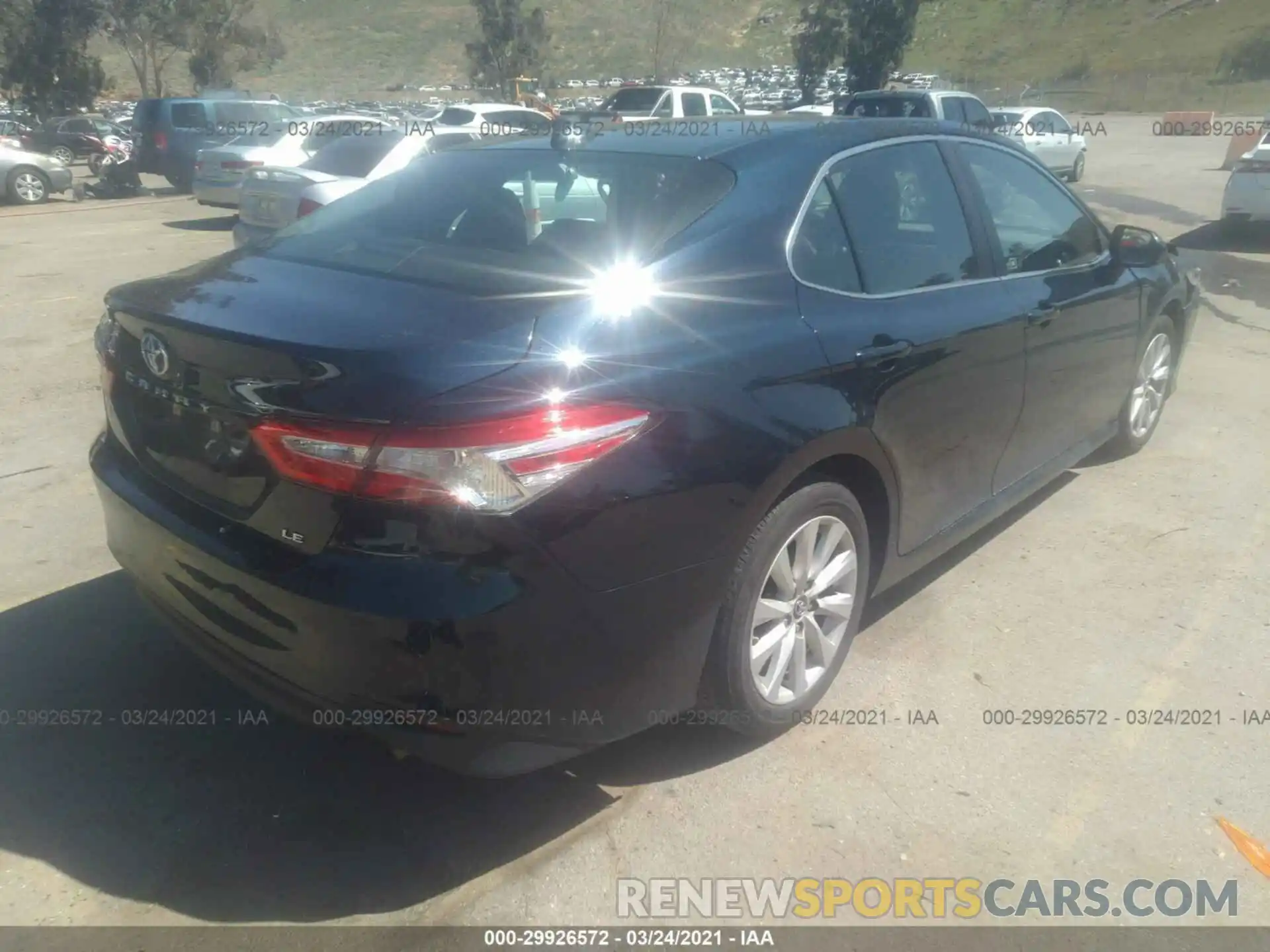 4 Photograph of a damaged car 4T1B11HK0KU263050 TOYOTA CAMRY 2019