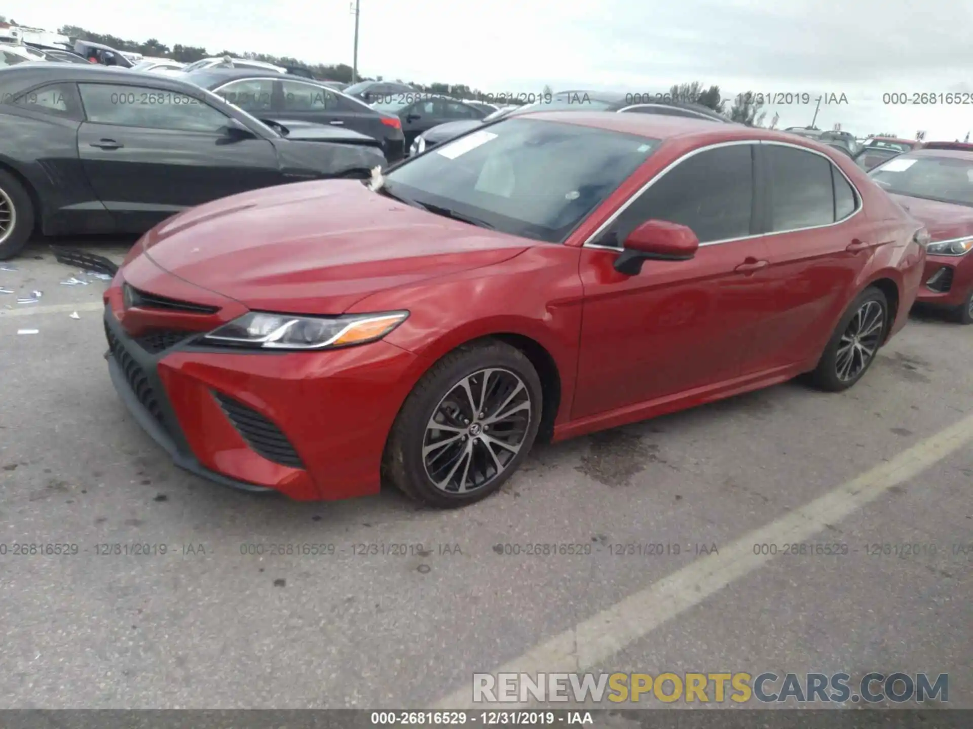 2 Photograph of a damaged car 4T1B11HK0KU264599 TOYOTA CAMRY 2019