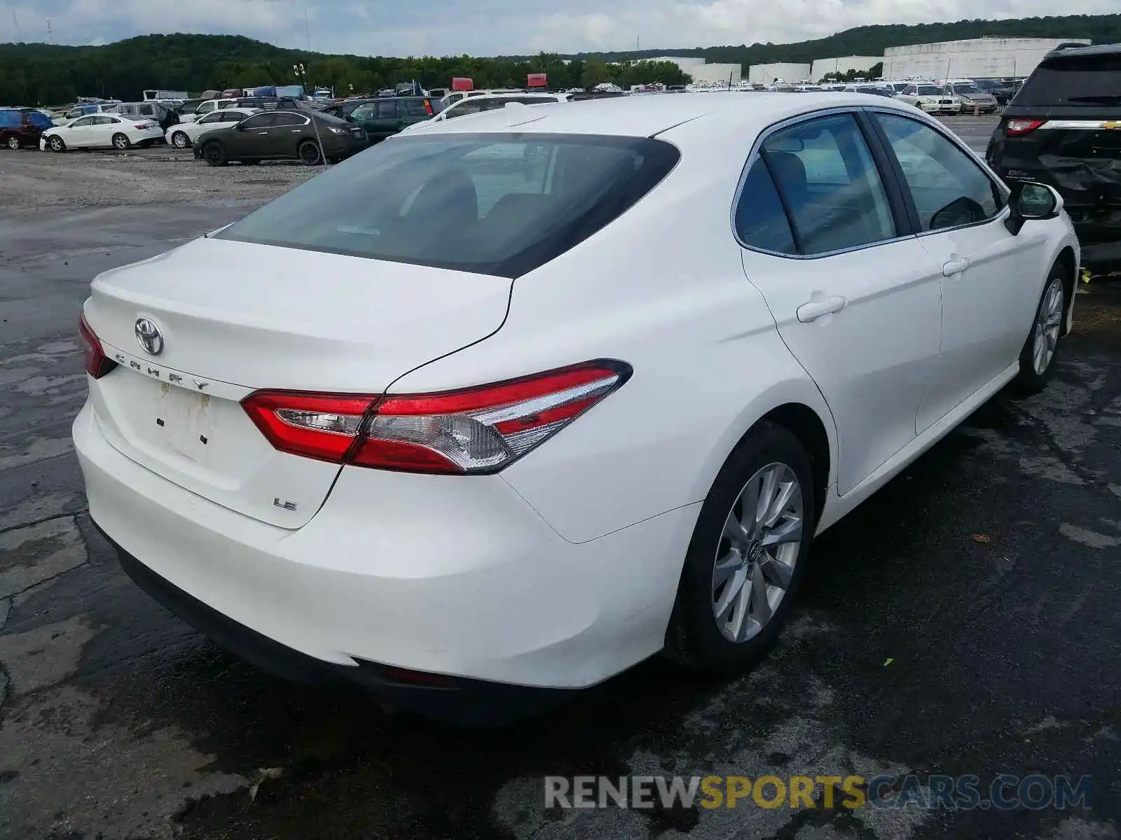 4 Photograph of a damaged car 4T1B11HK0KU268992 TOYOTA CAMRY 2019