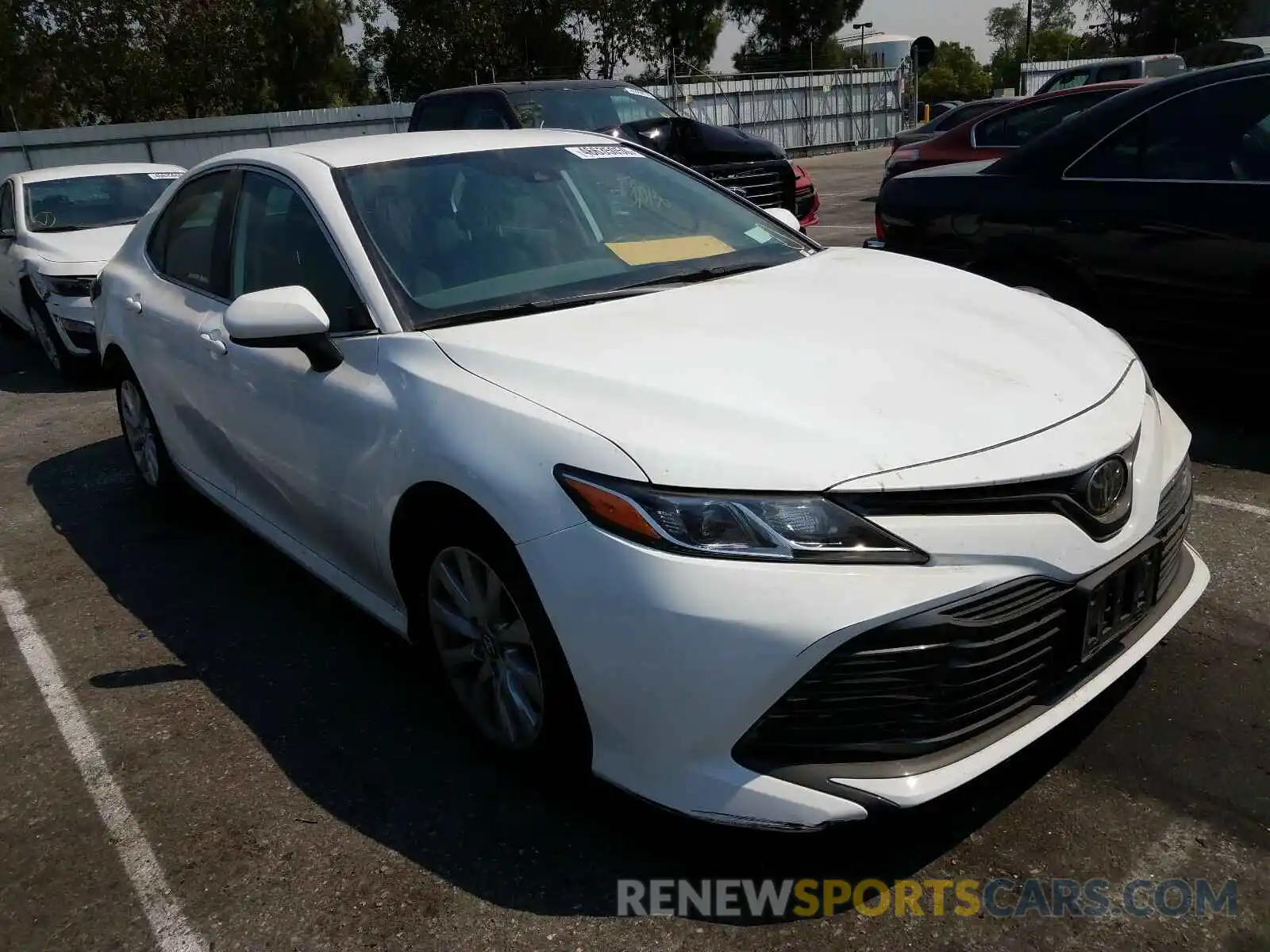 1 Photograph of a damaged car 4T1B11HK0KU270032 TOYOTA CAMRY 2019