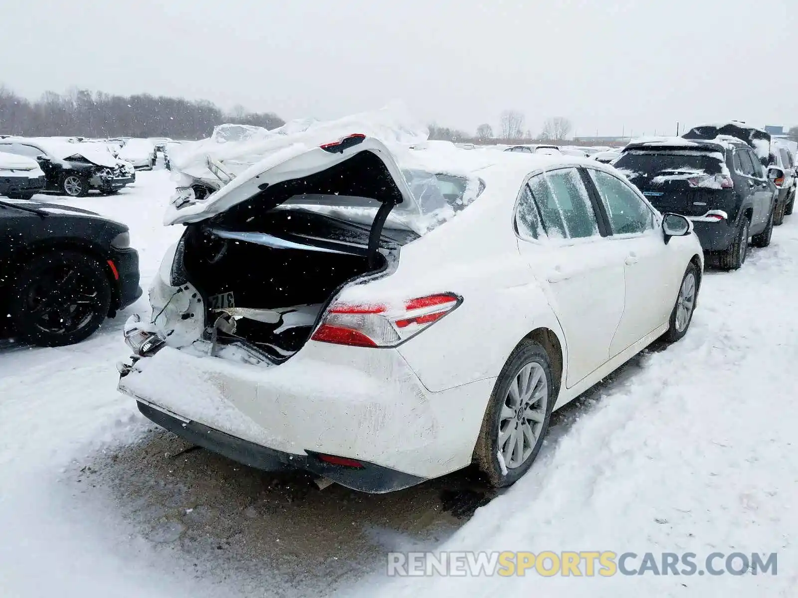 4 Photograph of a damaged car 4T1B11HK0KU270936 TOYOTA CAMRY 2019