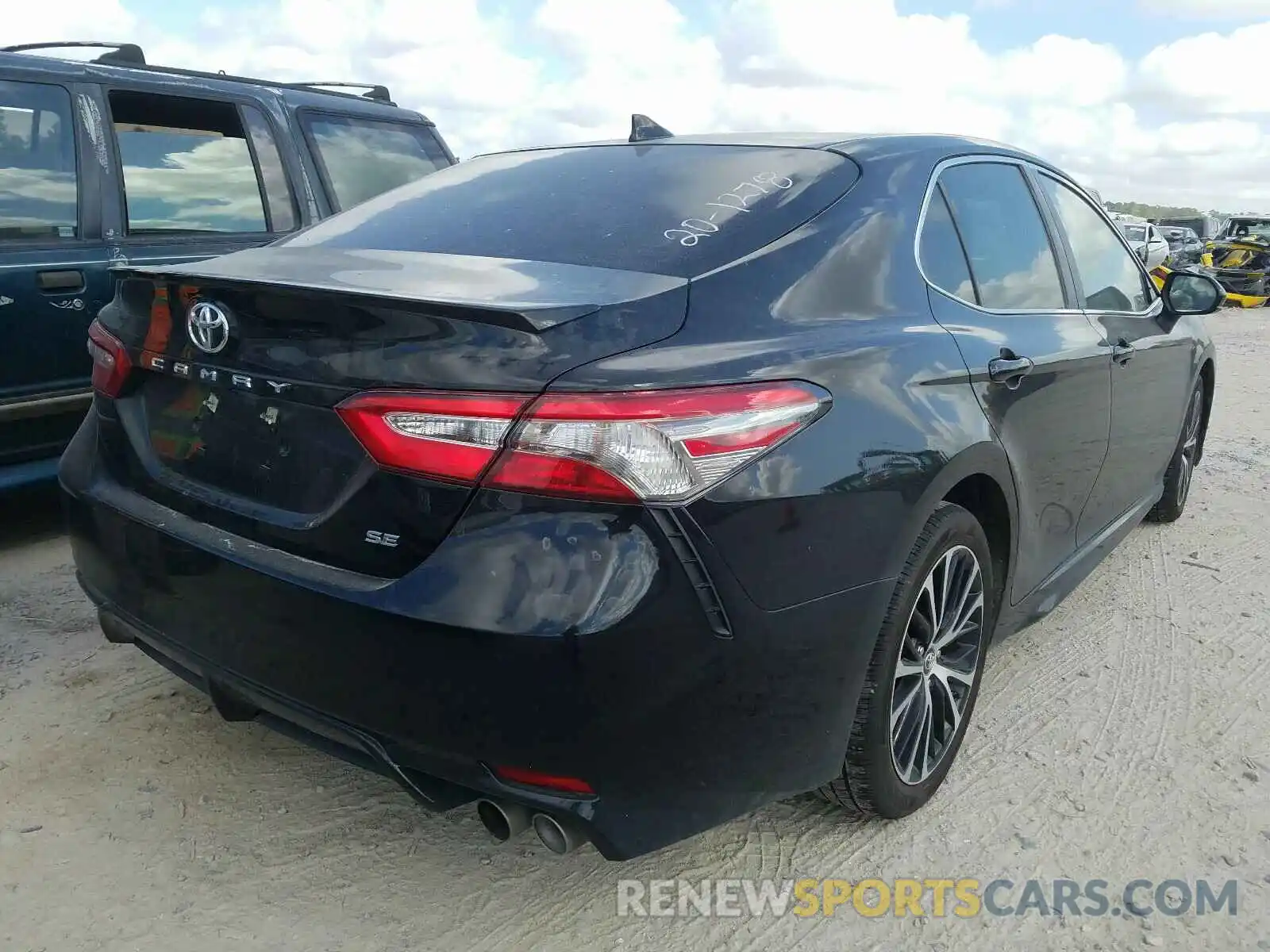 4 Photograph of a damaged car 4T1B11HK0KU275568 TOYOTA CAMRY 2019