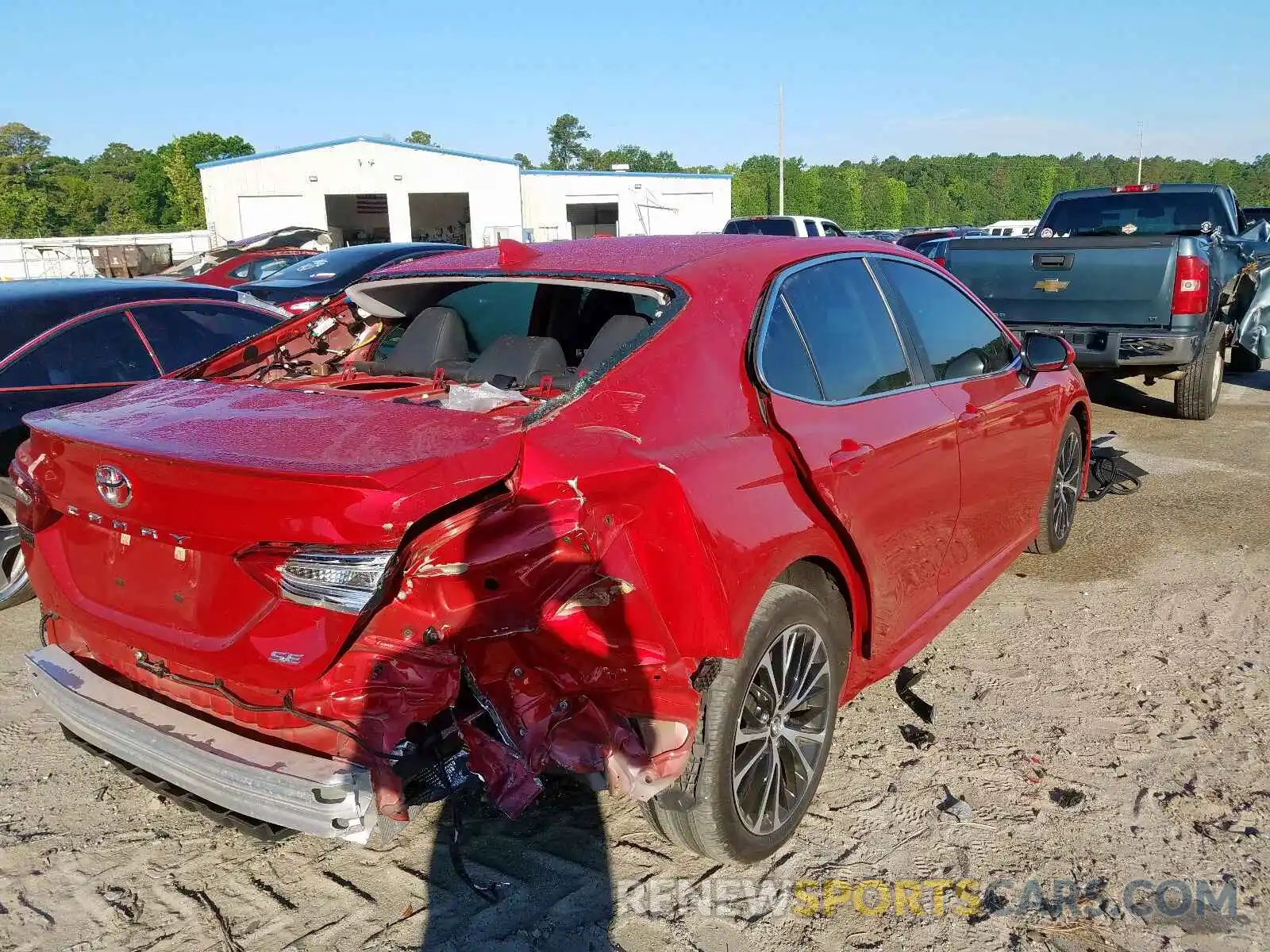 4 Photograph of a damaged car 4T1B11HK0KU281810 TOYOTA CAMRY 2019