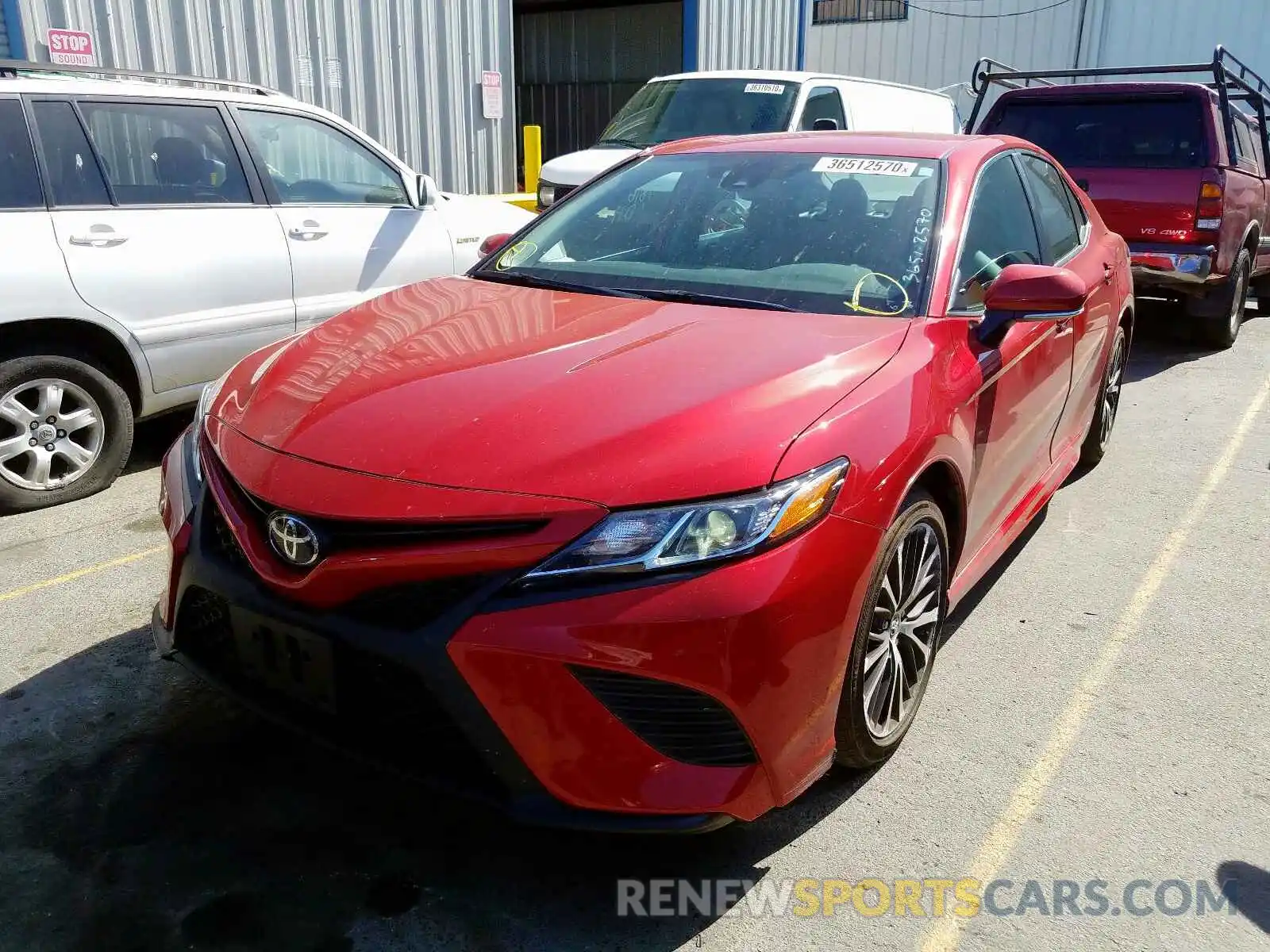 2 Photograph of a damaged car 4T1B11HK0KU284402 TOYOTA CAMRY 2019