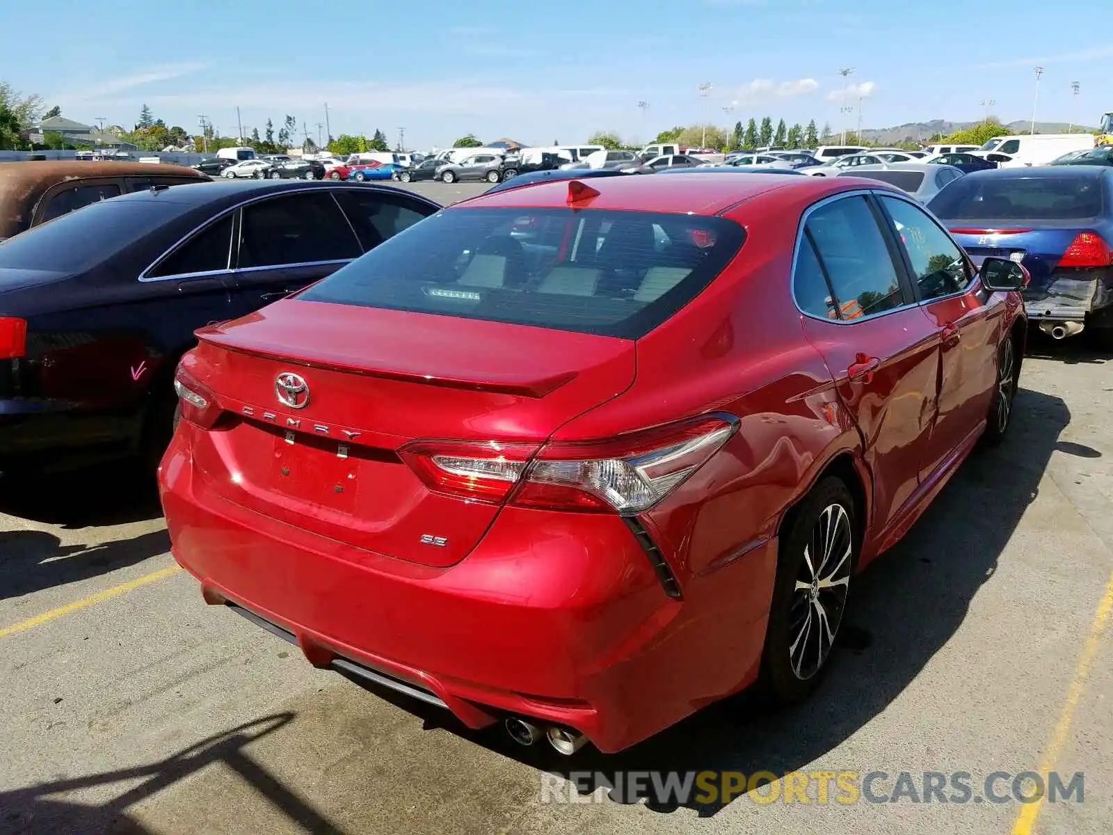 4 Photograph of a damaged car 4T1B11HK0KU284402 TOYOTA CAMRY 2019