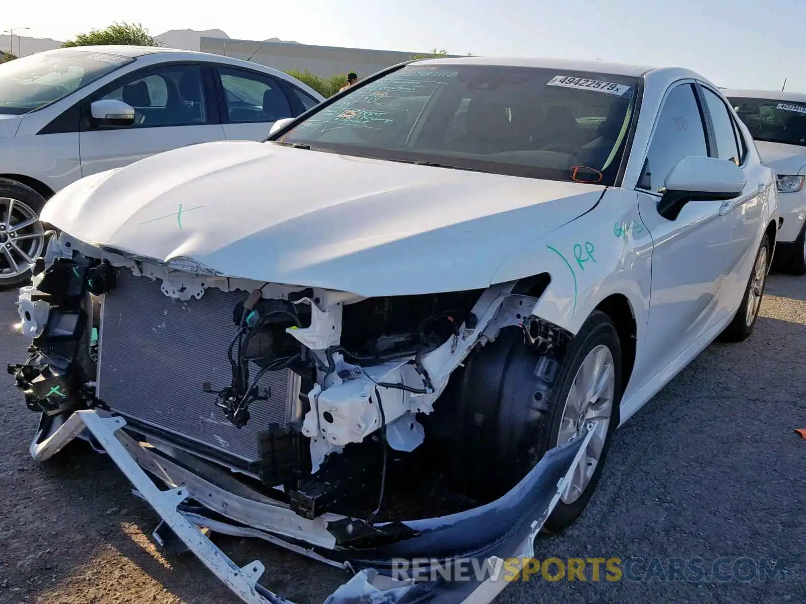 2 Photograph of a damaged car 4T1B11HK0KU284500 TOYOTA CAMRY 2019