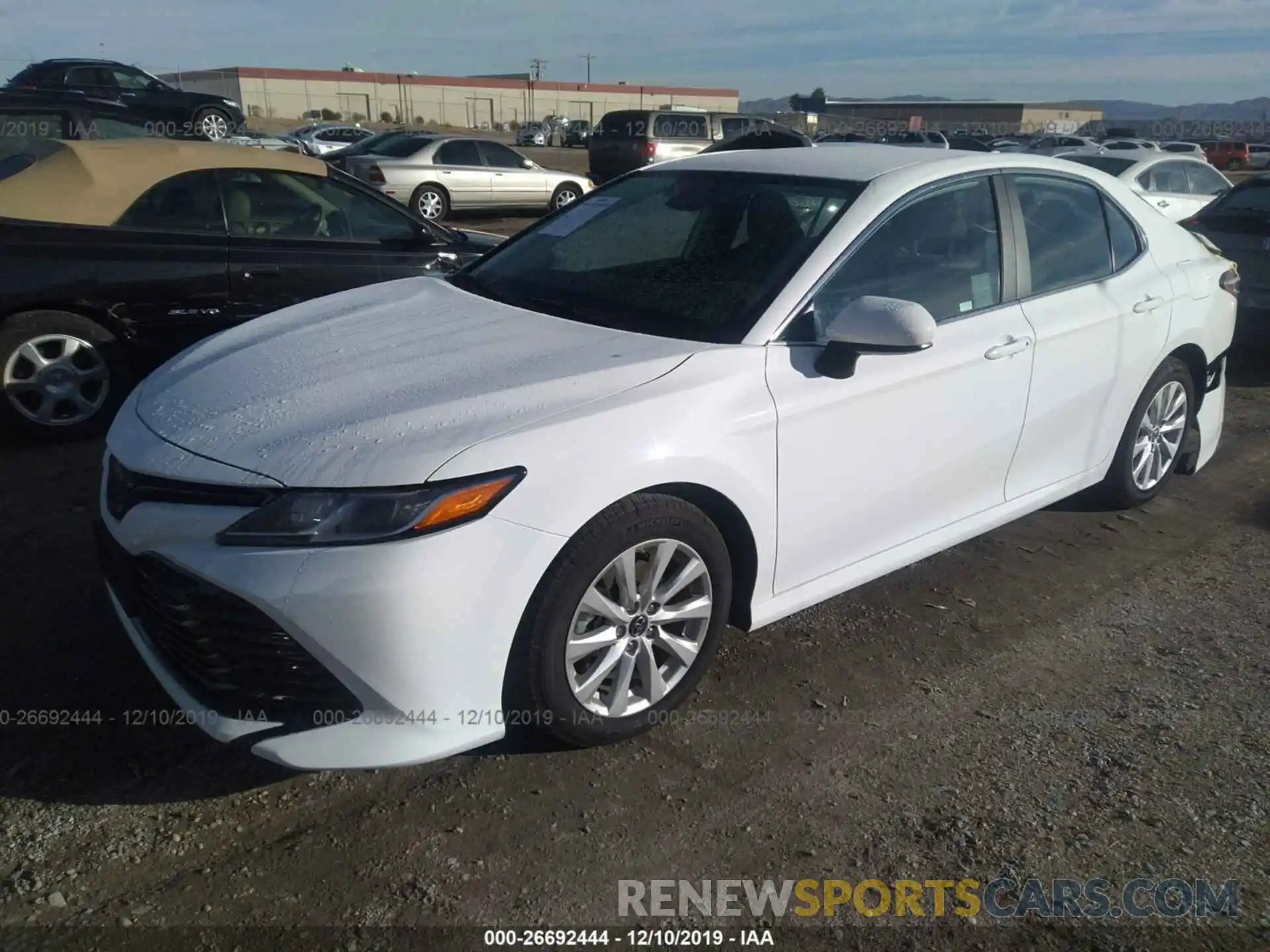 2 Photograph of a damaged car 4T1B11HK0KU285579 TOYOTA CAMRY 2019