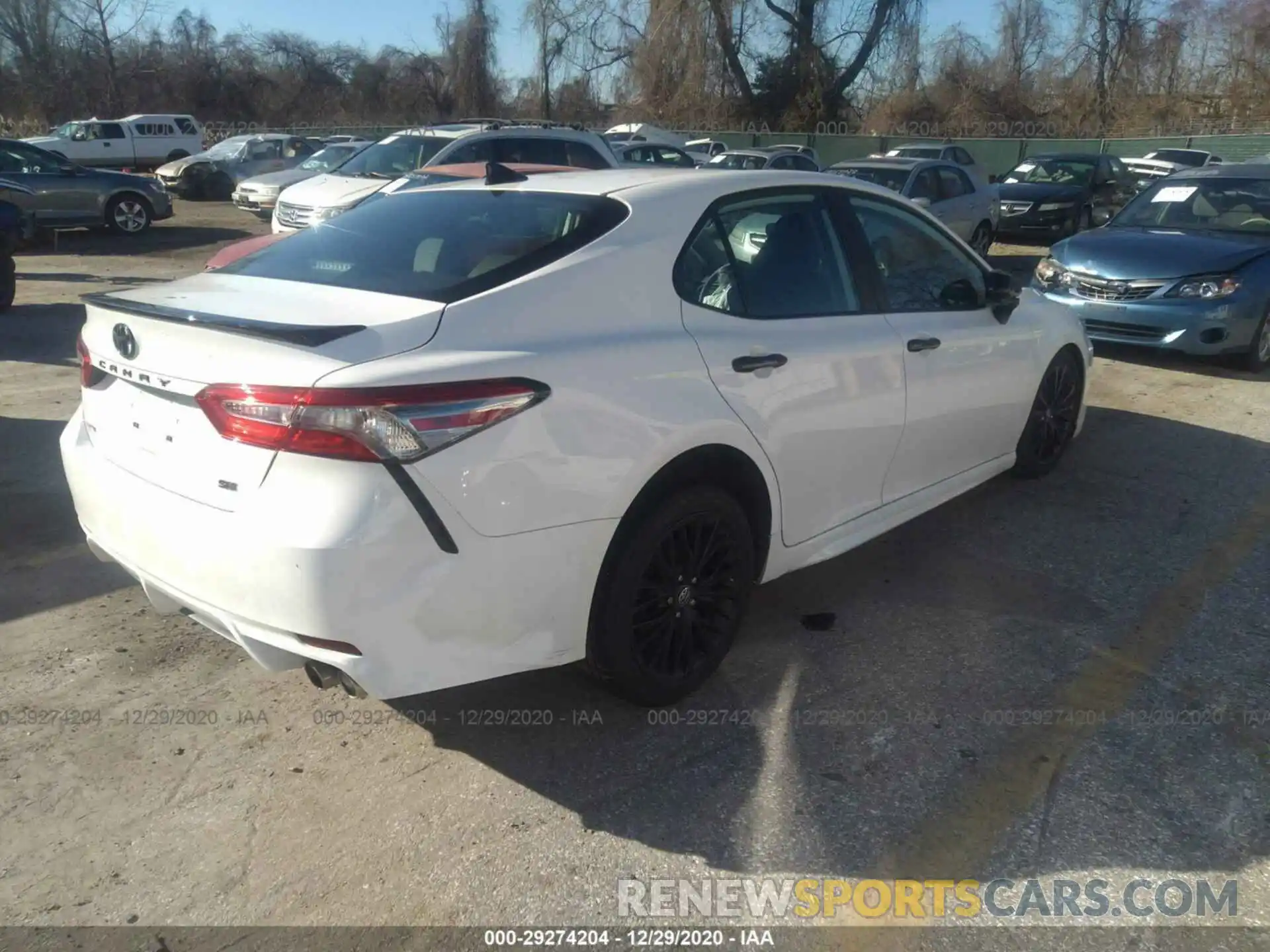 4 Photograph of a damaged car 4T1B11HK0KU290765 TOYOTA CAMRY 2019