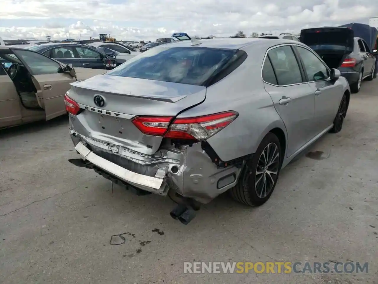 4 Photograph of a damaged car 4T1B11HK0KU297148 TOYOTA CAMRY 2019