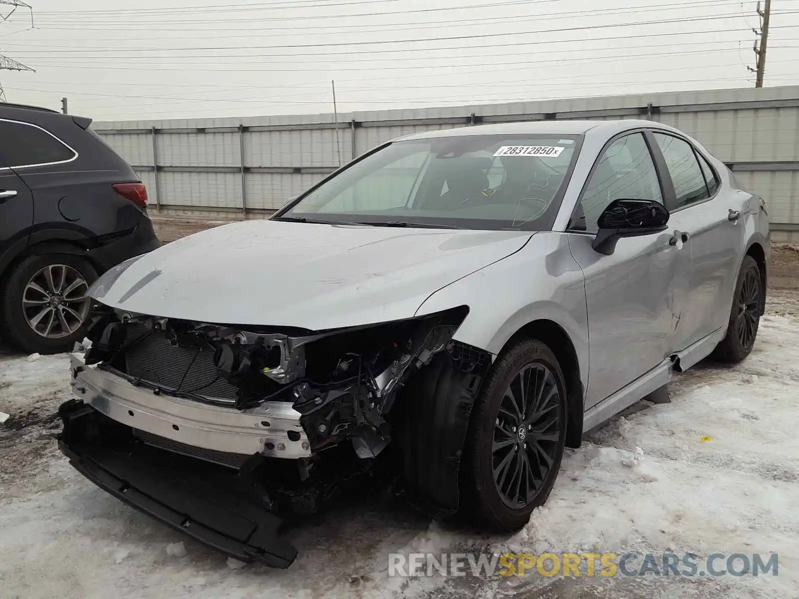 2 Photograph of a damaged car 4T1B11HK0KU297232 TOYOTA CAMRY 2019