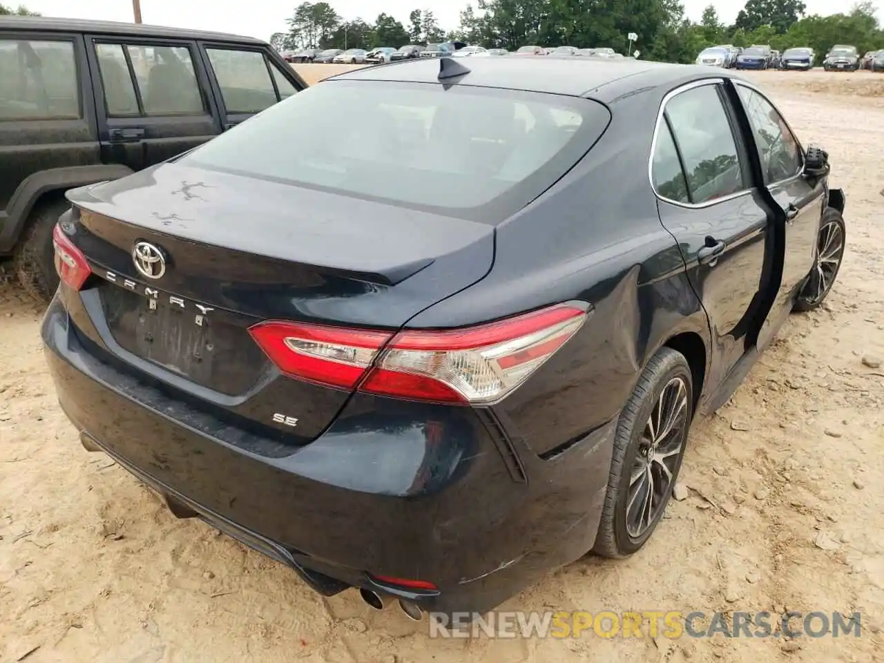 4 Photograph of a damaged car 4T1B11HK0KU297666 TOYOTA CAMRY 2019