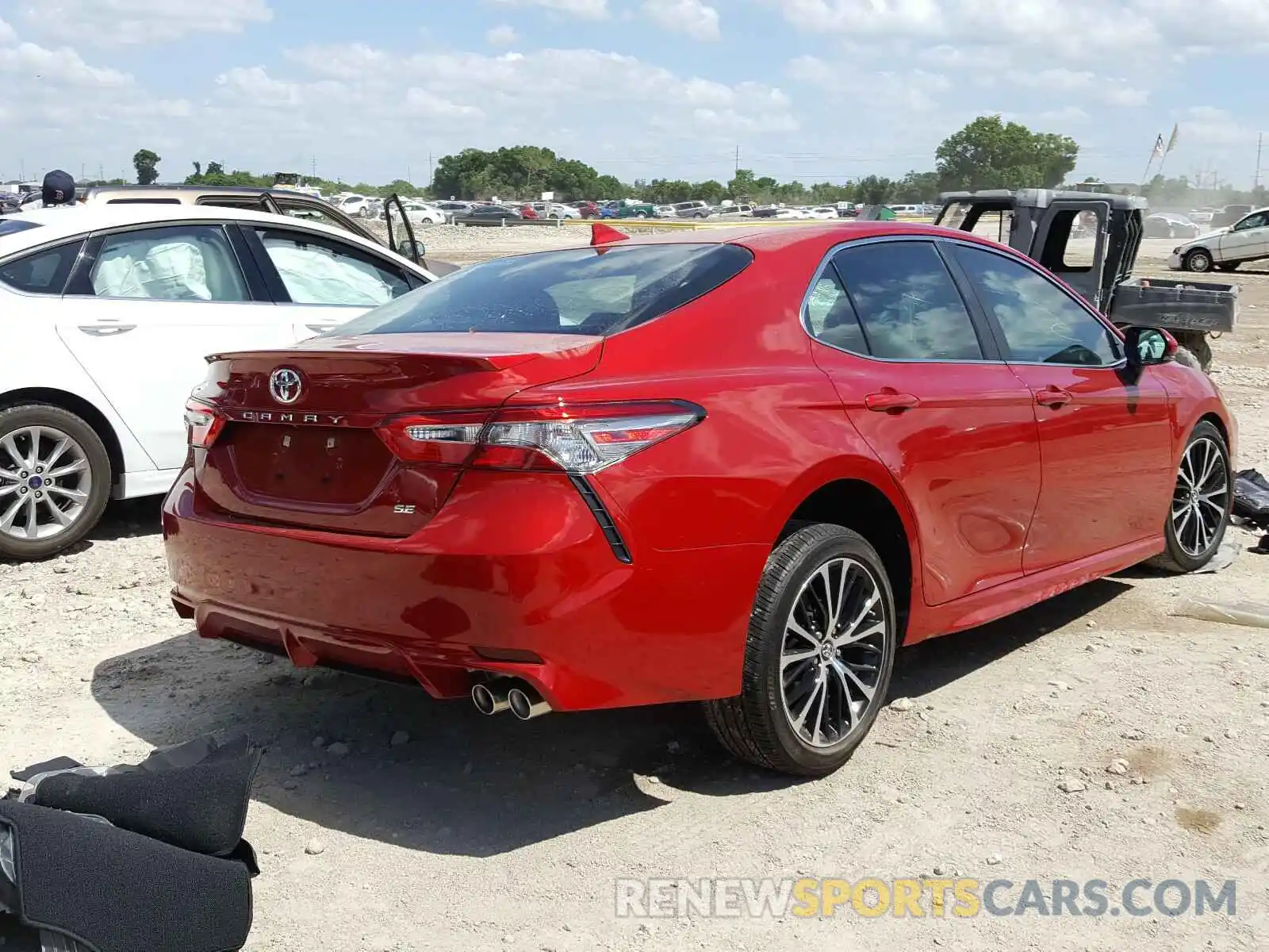 4 Photograph of a damaged car 4T1B11HK0KU298865 TOYOTA CAMRY 2019