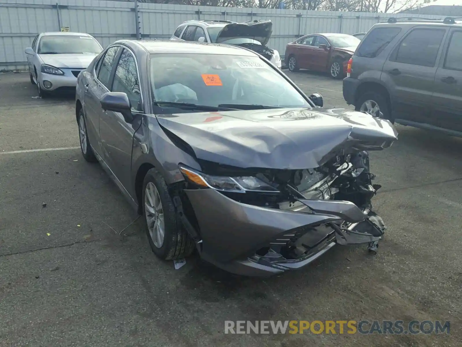 1 Photograph of a damaged car 4T1B11HK0KU679115 TOYOTA CAMRY 2019