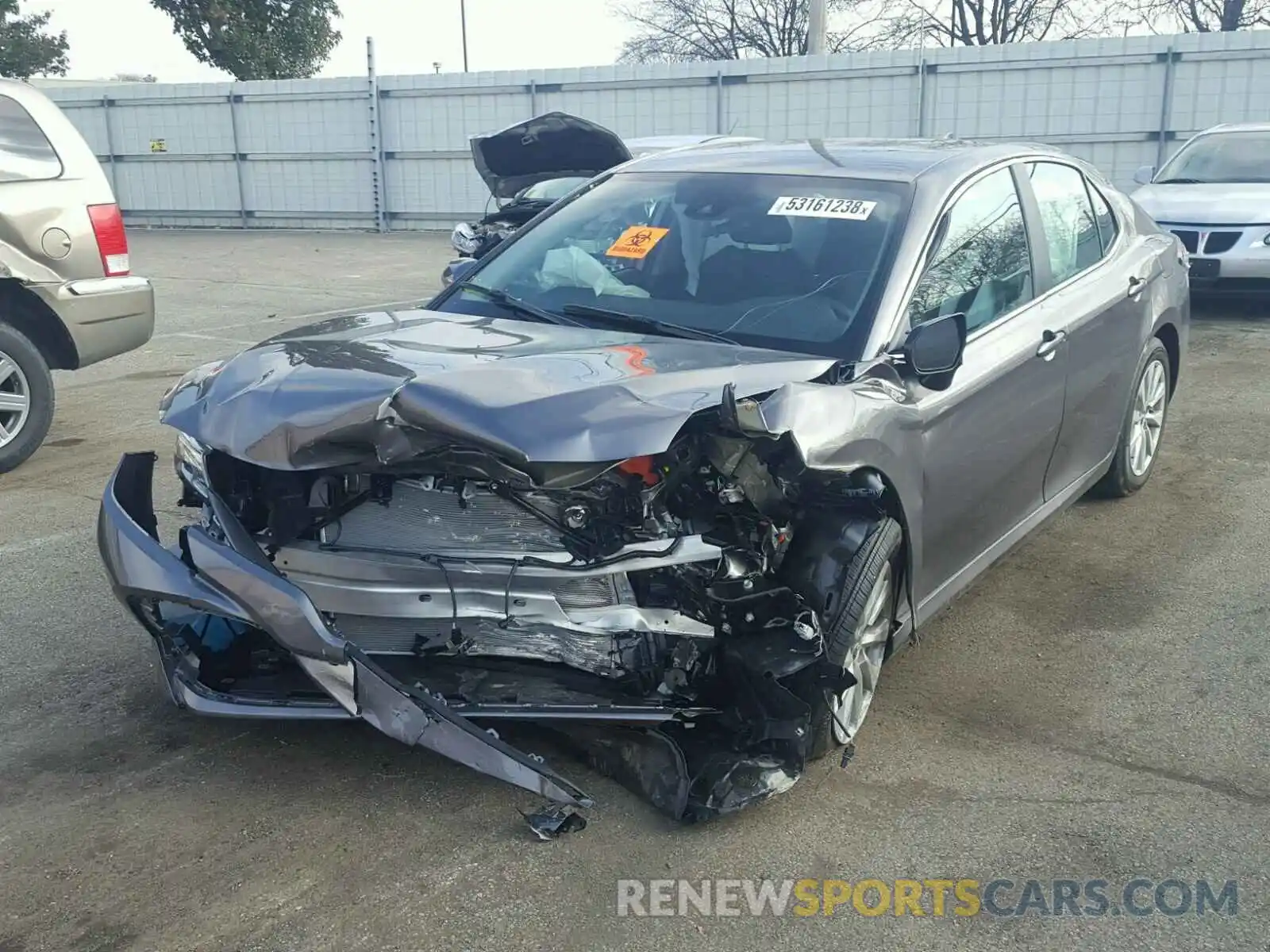 2 Photograph of a damaged car 4T1B11HK0KU679115 TOYOTA CAMRY 2019