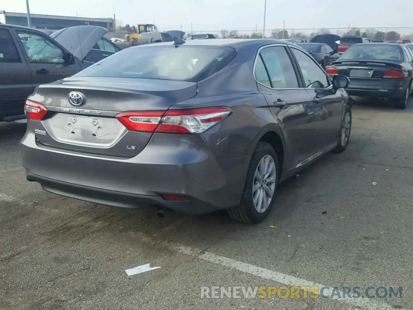 4 Photograph of a damaged car 4T1B11HK0KU679115 TOYOTA CAMRY 2019