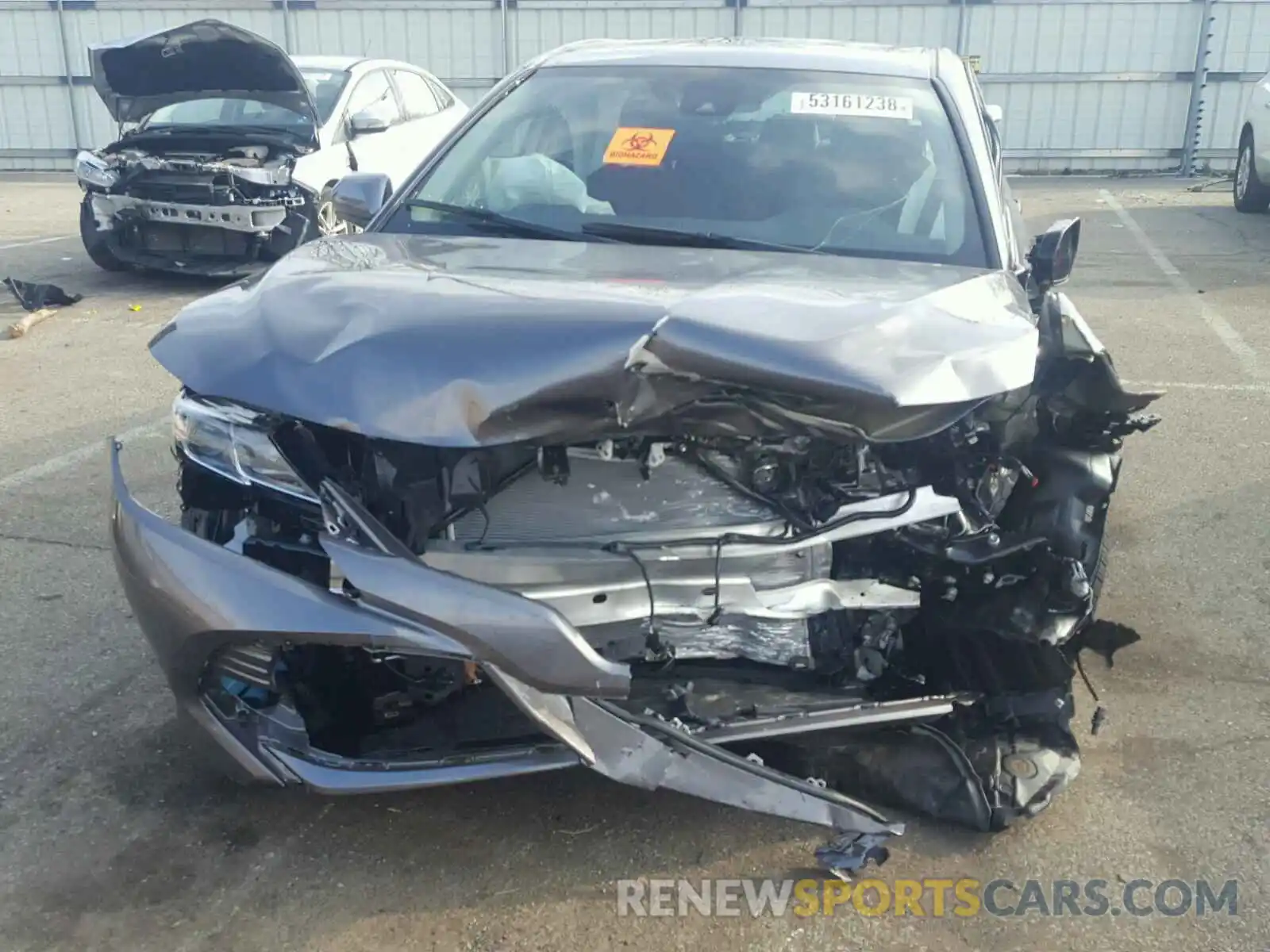 9 Photograph of a damaged car 4T1B11HK0KU679115 TOYOTA CAMRY 2019