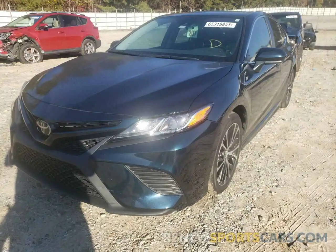 2 Photograph of a damaged car 4T1B11HK0KU679924 TOYOTA CAMRY 2019