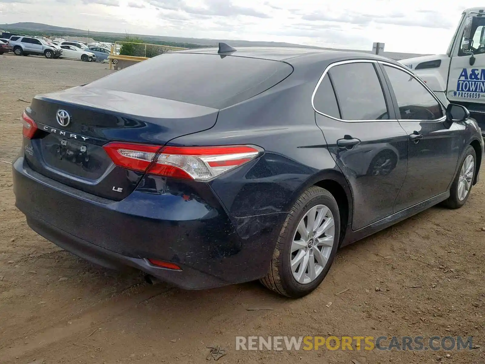 4 Photograph of a damaged car 4T1B11HK0KU680085 TOYOTA CAMRY 2019