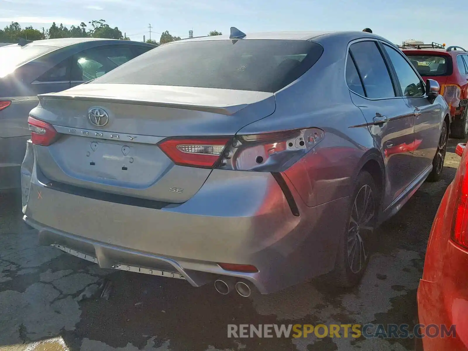 4 Photograph of a damaged car 4T1B11HK0KU681561 TOYOTA CAMRY 2019