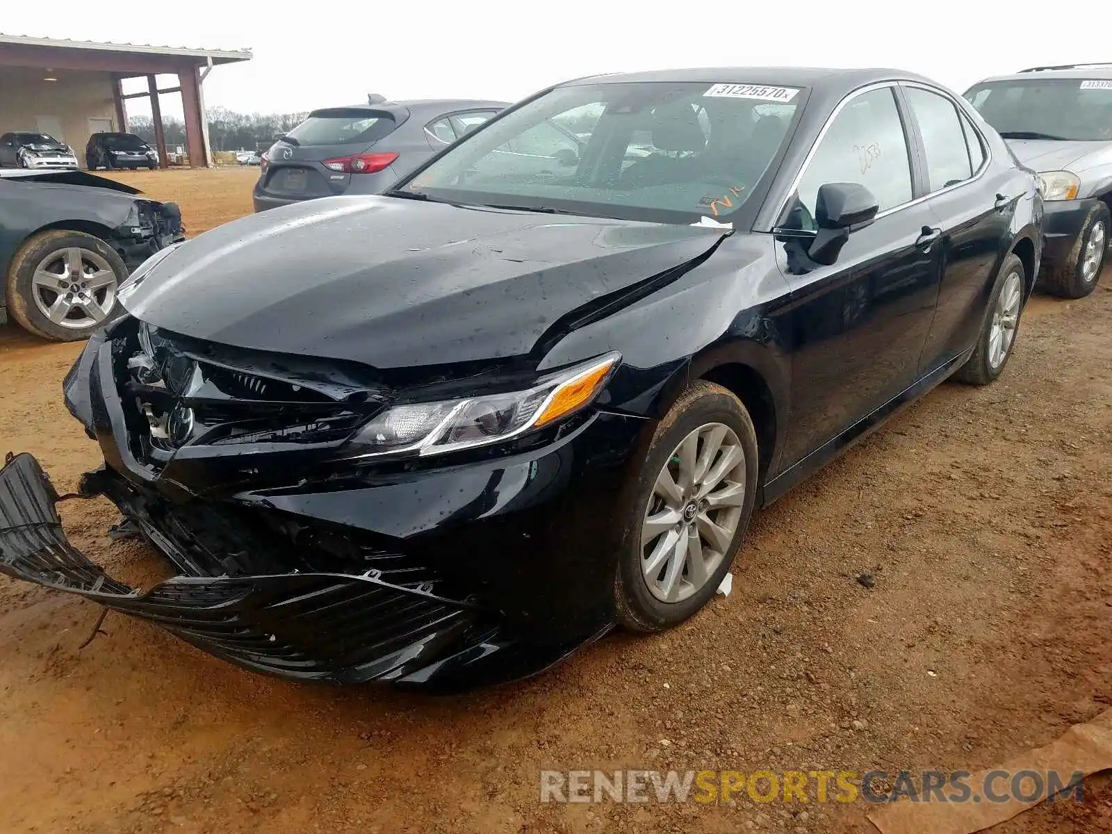 2 Photograph of a damaged car 4T1B11HK0KU681883 TOYOTA CAMRY 2019