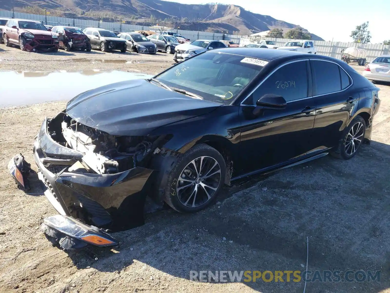 2 Photograph of a damaged car 4T1B11HK0KU683066 TOYOTA CAMRY 2019