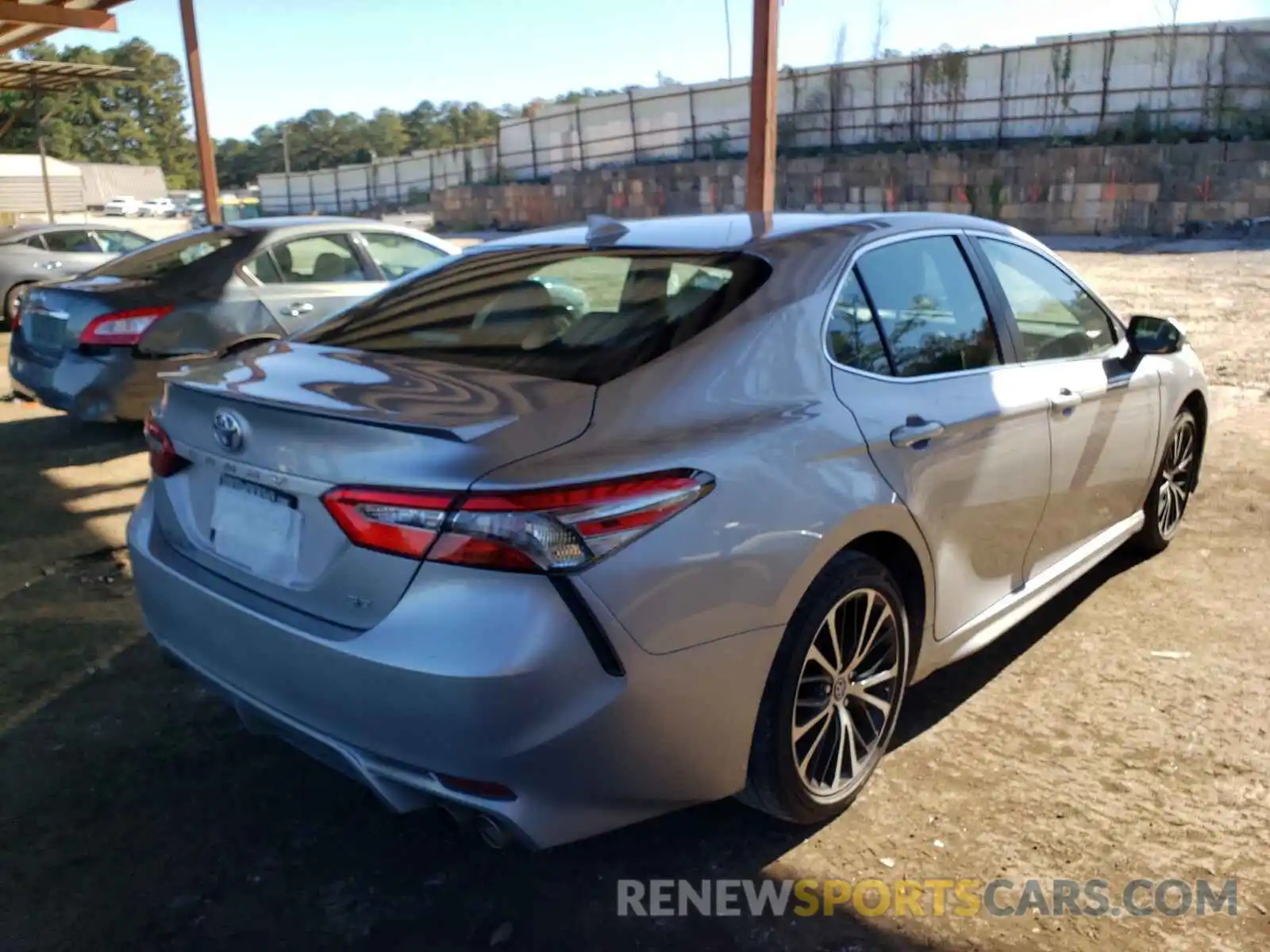 4 Photograph of a damaged car 4T1B11HK0KU683164 TOYOTA CAMRY 2019