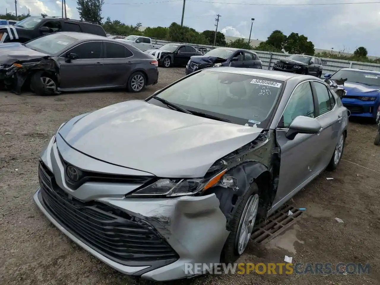 2 Photograph of a damaged car 4T1B11HK0KU684184 TOYOTA CAMRY 2019