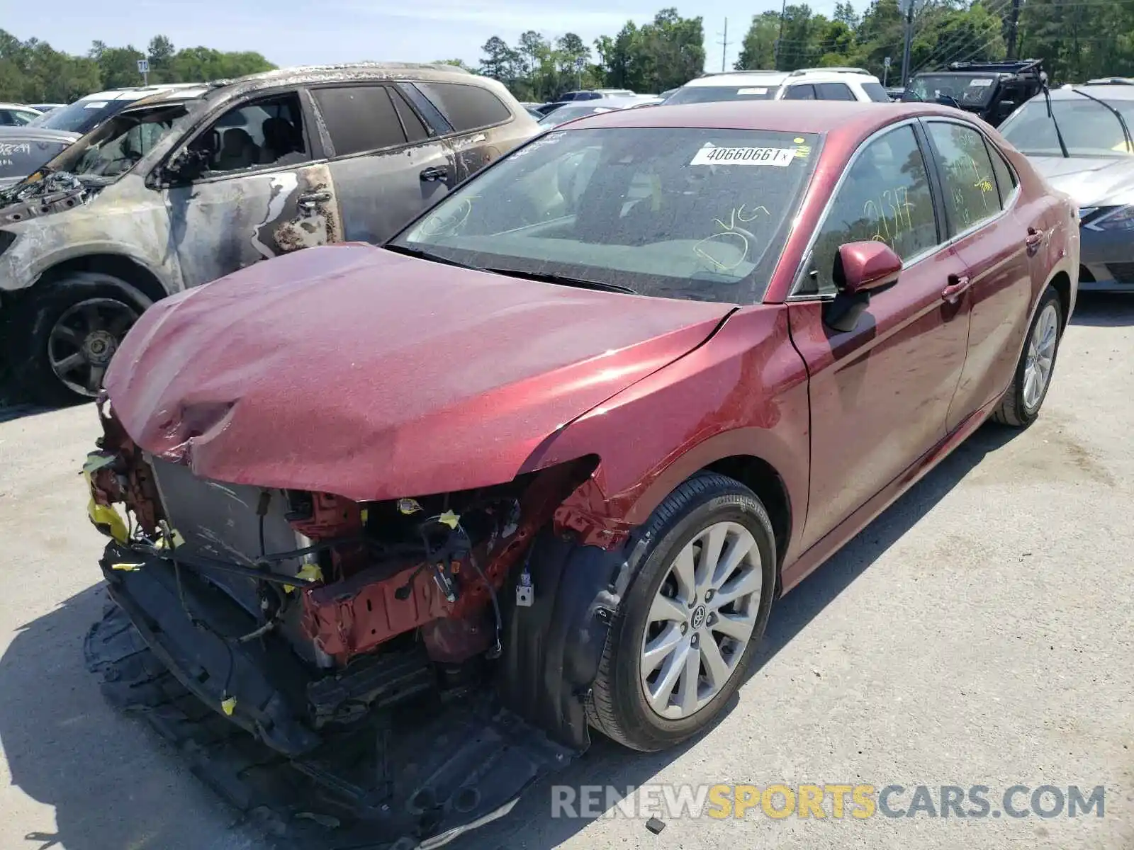 2 Photograph of a damaged car 4T1B11HK0KU686307 TOYOTA CAMRY 2019