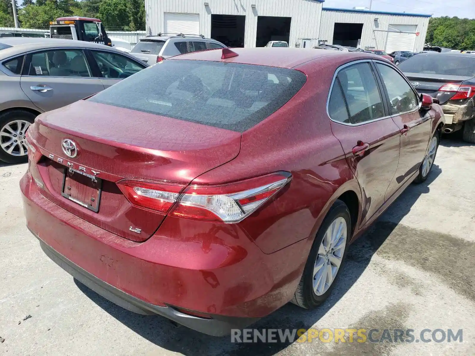 4 Photograph of a damaged car 4T1B11HK0KU686307 TOYOTA CAMRY 2019