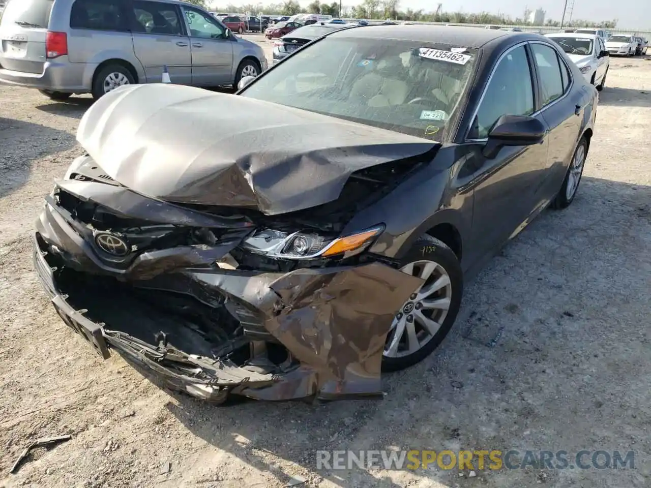 2 Photograph of a damaged car 4T1B11HK0KU686999 TOYOTA CAMRY 2019